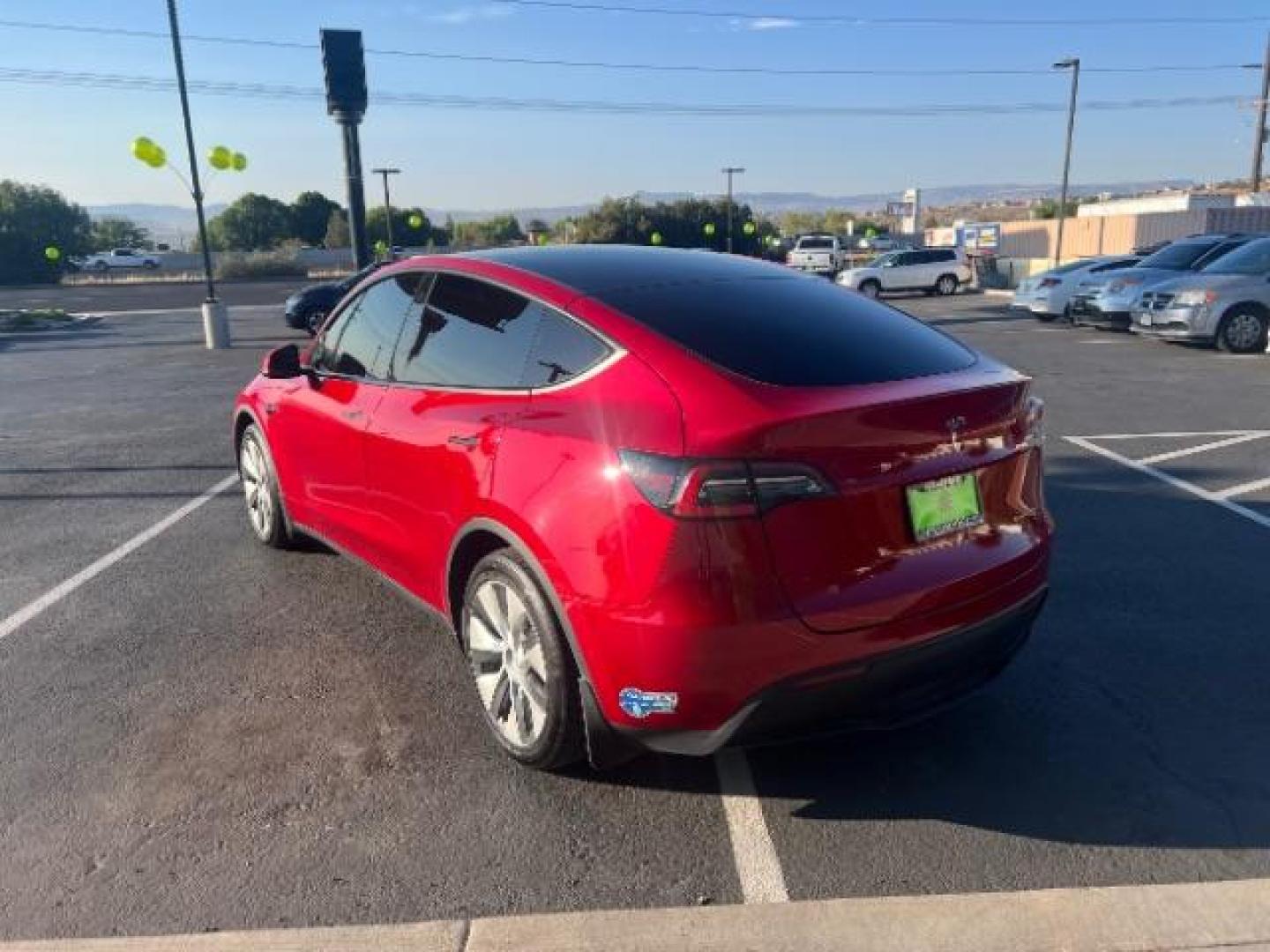 2021 Red Multi-Coat /Black Tesla Model Y Long Range Dual Motor All-Wheel Drive (5YJYGDEE8MF) with an ELECTRIC engine, Continuously Variable Transmission transmission, located at 1865 East Red Hills Pkwy, St. George, 84770, (435) 628-0023, 37.120850, -113.543640 - This Tesla is an AWD Long Range. Battery is 90% healthy, 289 on full charge. Near new condition! Full Tesla factory warranty up to 120k miles. Extended EV battery warranty available. Financing for ALL credit types. 4 Seasons Auto THE southern Utah Tesla Experts. Call or text for more info DL# 7 - Photo#6