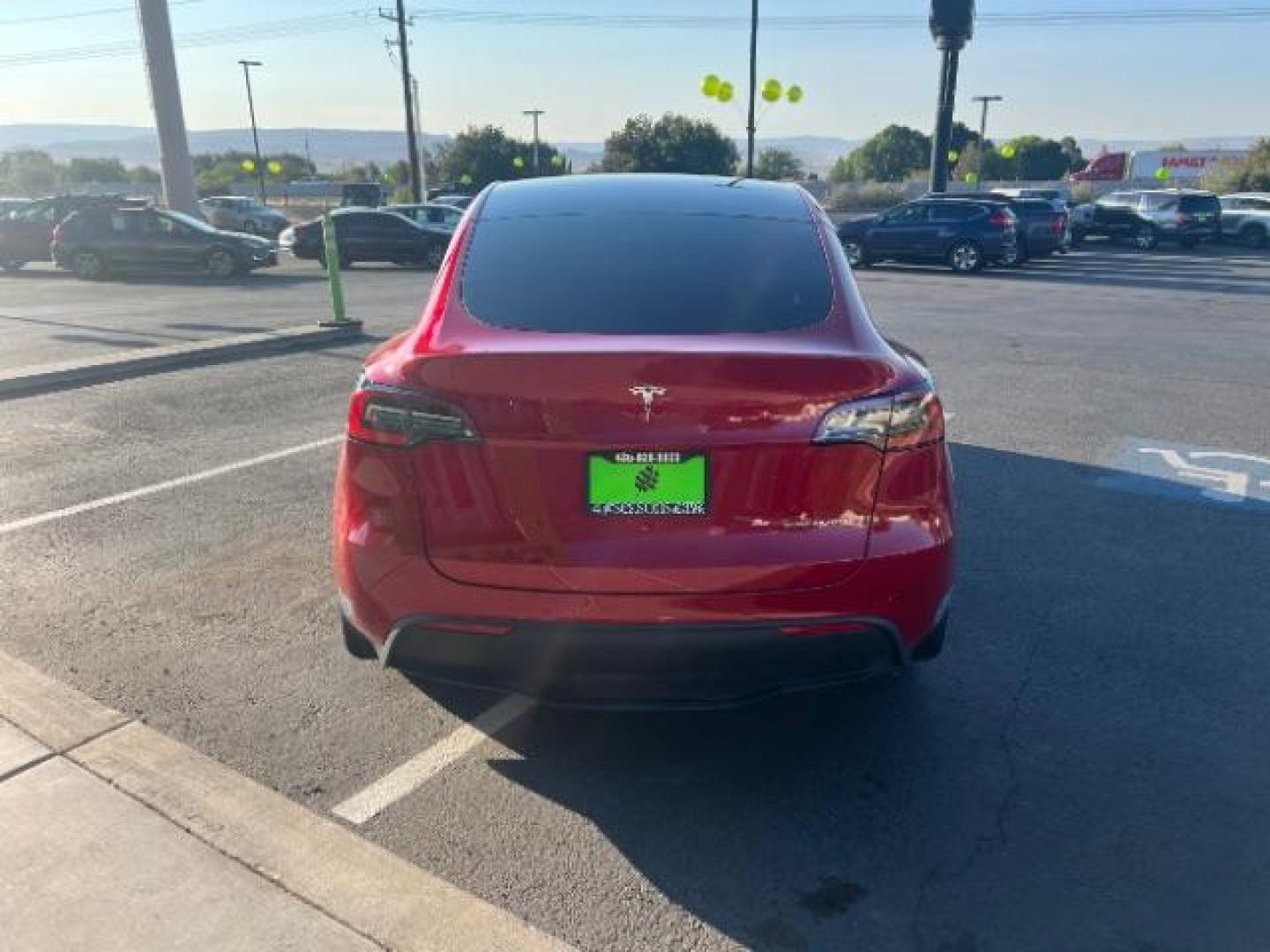 2021 Red Multi-Coat /Black Tesla Model Y Long Range Dual Motor All-Wheel Drive (5YJYGDEE8MF) with an ELECTRIC engine, Continuously Variable Transmission transmission, located at 1865 East Red Hills Pkwy, St. George, 84770, (435) 628-0023, 37.120850, -113.543640 - This Tesla is an AWD Long Range. Battery is 90% healthy, 289 on full charge. Near new condition! Full Tesla factory warranty up to 120k miles. Extended EV battery warranty available. Financing for ALL credit types. 4 Seasons Auto THE southern Utah Tesla Experts. Call or text for more info DL# 7 - Photo#7