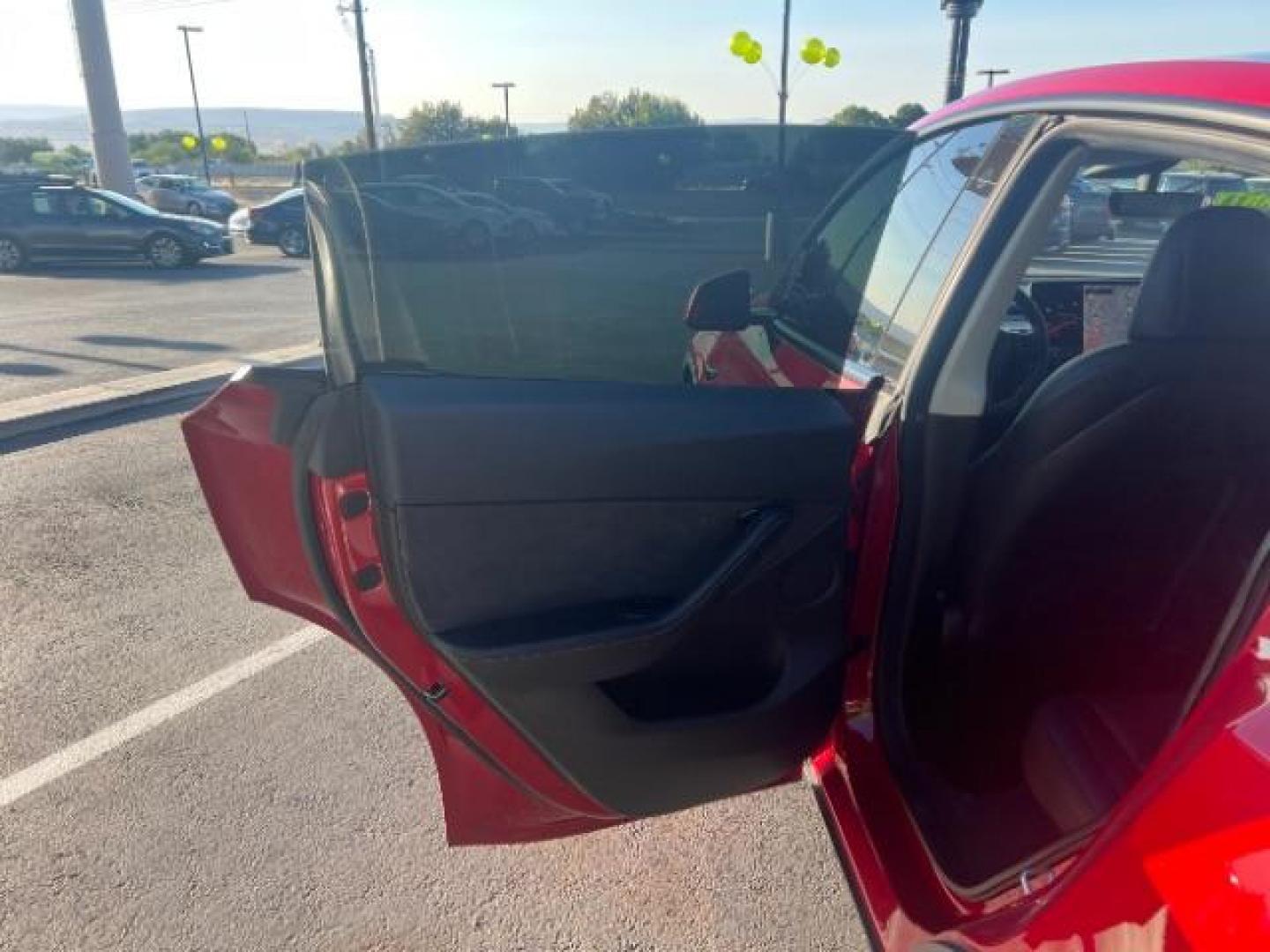 2021 Red Multi-Coat /Black Tesla Model Y Long Range Dual Motor All-Wheel Drive (5YJYGDEE8MF) with an ELECTRIC engine, Continuously Variable Transmission transmission, located at 1865 East Red Hills Pkwy, St. George, 84770, (435) 628-0023, 37.120850, -113.543640 - This Tesla is an AWD Long Range. Battery is 90% healthy, 289 on full charge. Near new condition! Full Tesla factory warranty up to 120k miles. Extended EV battery warranty available. Financing for ALL credit types. 4 Seasons Auto THE southern Utah Tesla Experts. Call or text for more info DL# 7 - Photo#20