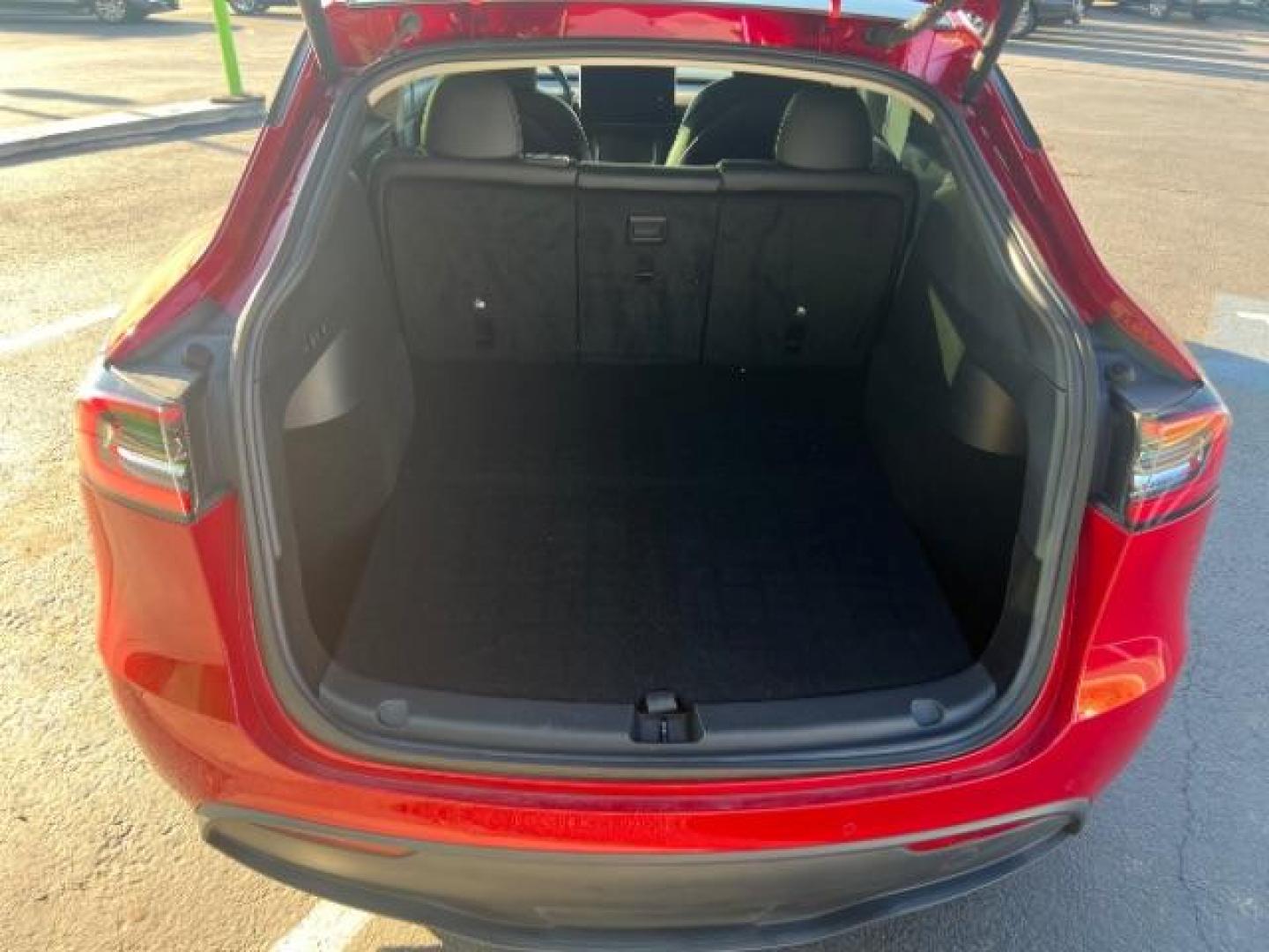 2021 Red Multi-Coat /Black Tesla Model Y Long Range Dual Motor All-Wheel Drive (5YJYGDEE8MF) with an ELECTRIC engine, Continuously Variable Transmission transmission, located at 1865 East Red Hills Pkwy, St. George, 84770, (435) 628-0023, 37.120850, -113.543640 - This Tesla is an AWD Long Range. Battery is 90% healthy, 289 on full charge. Near new condition! Full Tesla factory warranty up to 120k miles. Extended EV battery warranty available. Financing for ALL credit types. 4 Seasons Auto THE southern Utah Tesla Experts. Call or text for more info DL# 7 - Photo#23