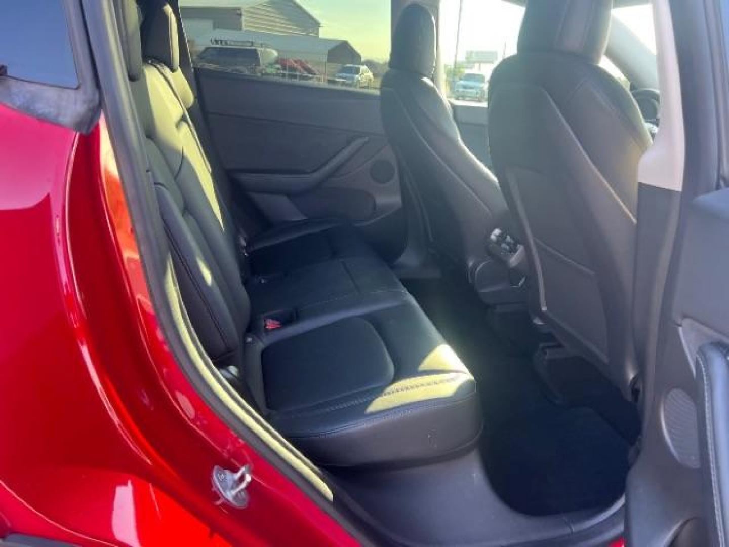 2021 Red Multi-Coat /Black Tesla Model Y Long Range Dual Motor All-Wheel Drive (5YJYGDEE8MF) with an ELECTRIC engine, Continuously Variable Transmission transmission, located at 1865 East Red Hills Pkwy, St. George, 84770, (435) 628-0023, 37.120850, -113.543640 - This Tesla is an AWD Long Range. Battery is 90% healthy, 289 on full charge. Near new condition! Full Tesla factory warranty up to 120k miles. Extended EV battery warranty available. Financing for ALL credit types. 4 Seasons Auto THE southern Utah Tesla Experts. Call or text for more info DL# 7 - Photo#25