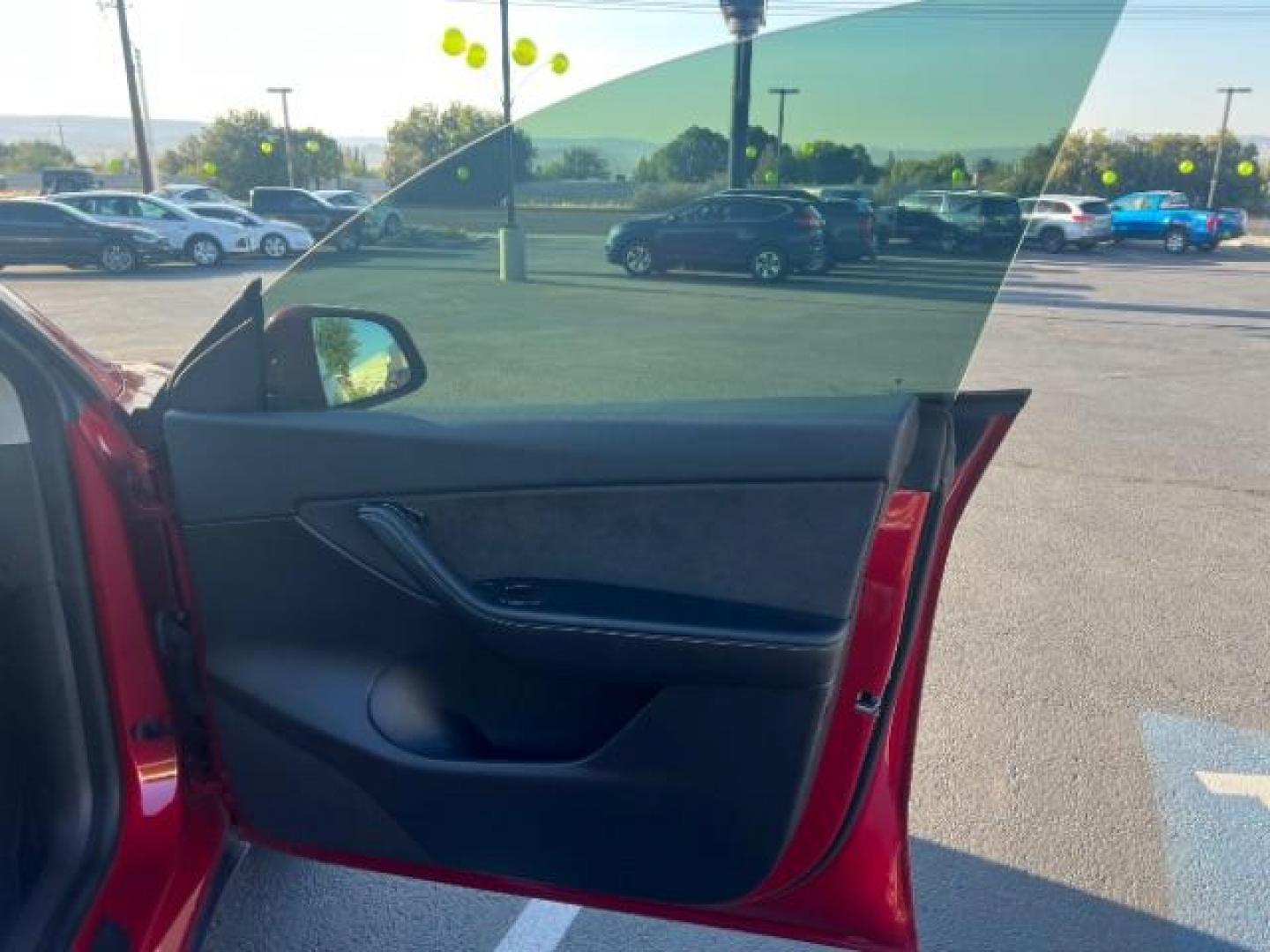 2021 Red Multi-Coat /Black Tesla Model Y Long Range Dual Motor All-Wheel Drive (5YJYGDEE8MF) with an ELECTRIC engine, Continuously Variable Transmission transmission, located at 1865 East Red Hills Pkwy, St. George, 84770, (435) 628-0023, 37.120850, -113.543640 - This Tesla is an AWD Long Range. Battery is 90% healthy, 289 on full charge. Near new condition! Full Tesla factory warranty up to 120k miles. Extended EV battery warranty available. Financing for ALL credit types. 4 Seasons Auto THE southern Utah Tesla Experts. Call or text for more info DL# 7 - Photo#26