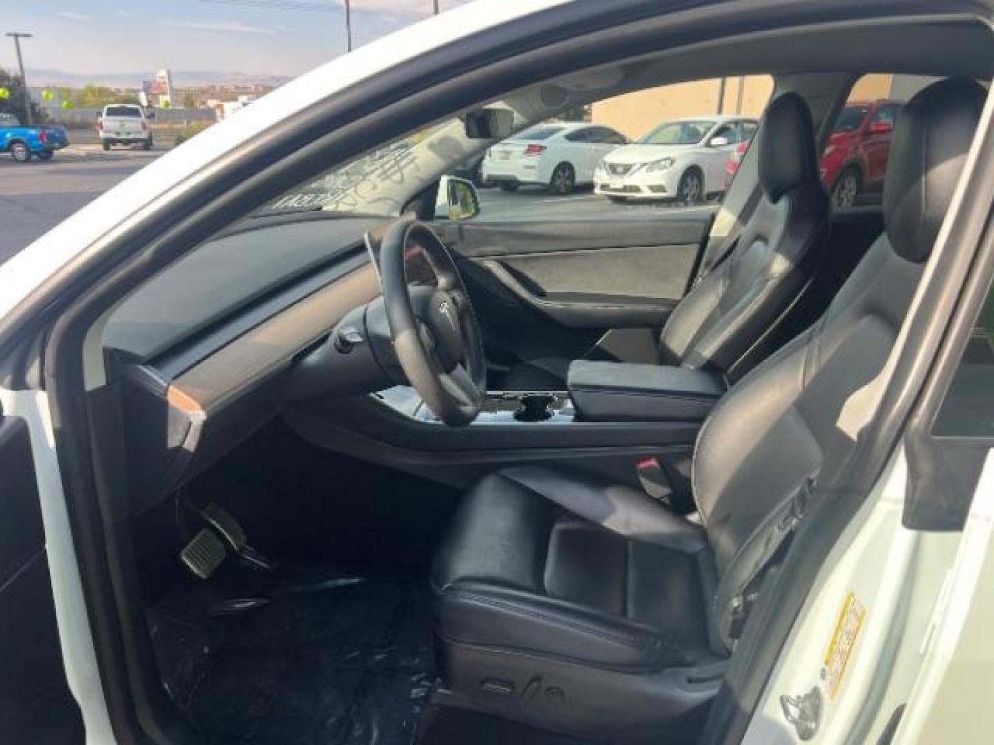2020 Pearl White Multi-Coat /Black Tesla Model Y Long Range Dual Motor All-Wheel Drive (5YJYGDEE9LF) with an ELECTRIC engine, Continuously Variable Transmission transmission, located at 1865 East Red Hills Pkwy, St. George, 84770, (435) 628-0023, 37.120850, -113.543640 - ****Price includes $4k IRS EV REBATE**** We are approved to file the EV rebate directly with the IRS. We recived the funds in 7 days and take credit off the price of car. Check with IRS EV website to be sure you qualify. This program ends Sept 30th so ACT FAST! This Tesla is an AWD Long Range. Bat - Photo#16