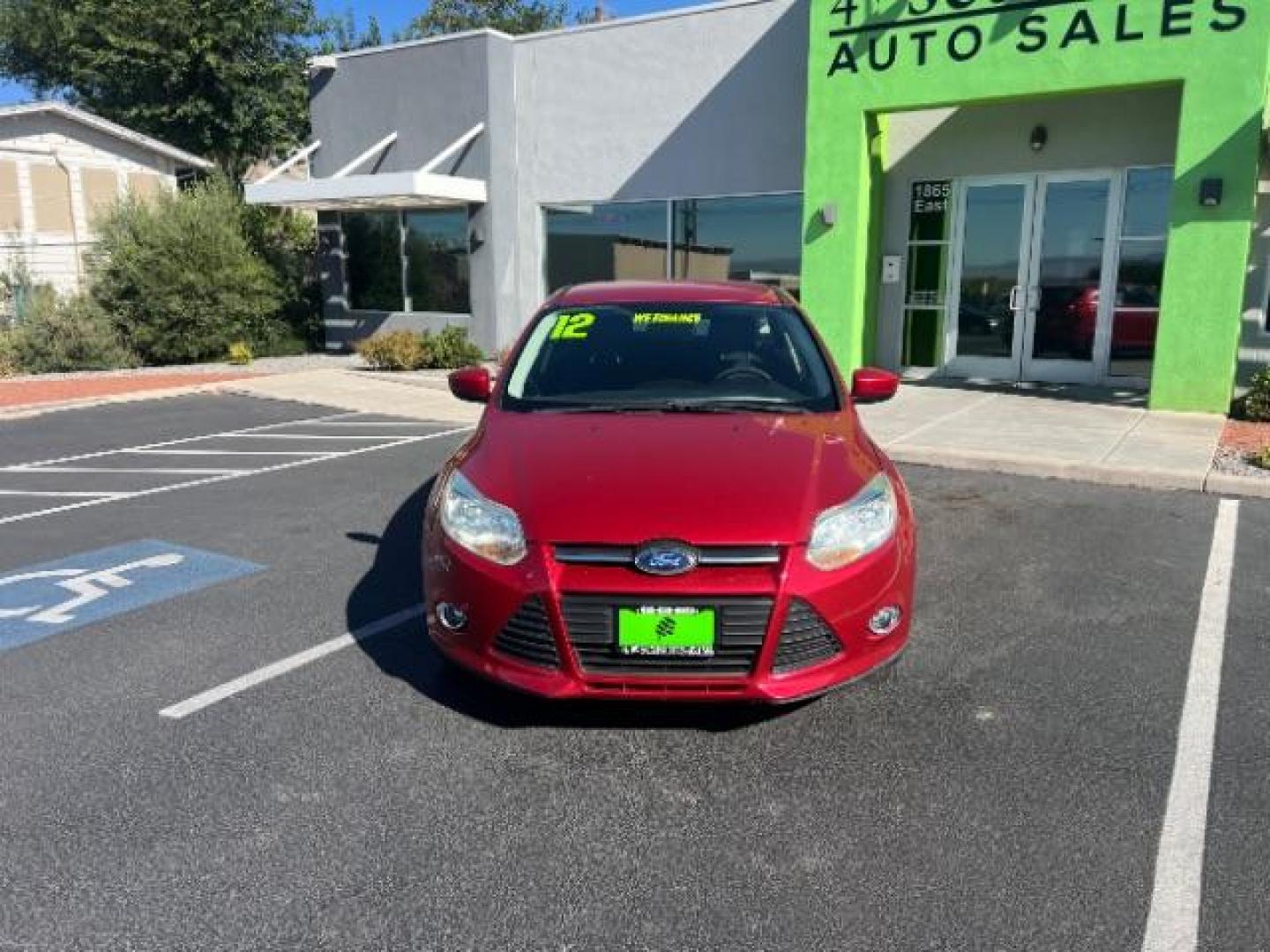 2012 Candy Red Metallic Tinted Clearcoat /Charcoal Black w/Warm Steel Surround Ford Focus SE (1FAHP3K27CL) with an 2L I-4 gasoline direct injection engine, Automatic transmission, located at 1865 East Red Hills Pkwy, St. George, 84770, (435) 628-0023, 37.120850, -113.543640 - We specialize in helping ALL people get the best financing available. No matter your credit score, good, bad or none we can get you an amazing rate. Had a bankruptcy, divorce, or repossessions? We give you the green light to get your credit back on the road. Low down and affordable payments that fit - Photo#1