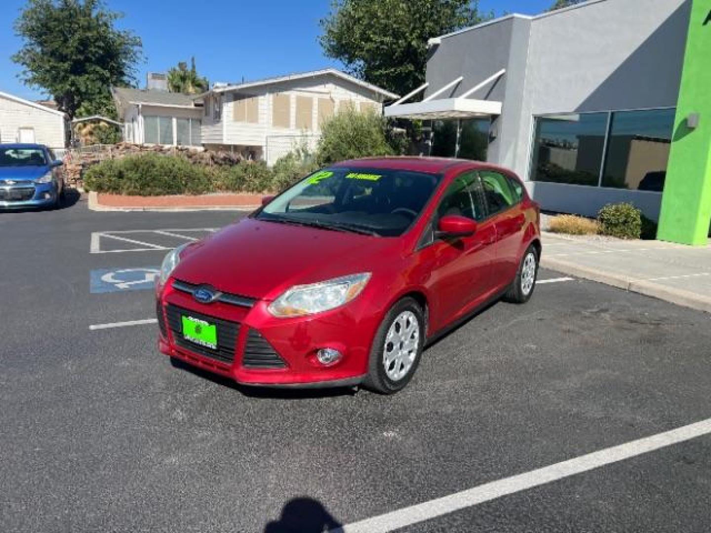 2012 Candy Red Metallic Tinted Clearcoat /Charcoal Black w/Warm Steel Surround Ford Focus SE (1FAHP3K27CL) with an 2L I-4 gasoline direct injection engine, Automatic transmission, located at 1865 East Red Hills Pkwy, St. George, 84770, (435) 628-0023, 37.120850, -113.543640 - We specialize in helping ALL people get the best financing available. No matter your credit score, good, bad or none we can get you an amazing rate. Had a bankruptcy, divorce, or repossessions? We give you the green light to get your credit back on the road. Low down and affordable payments that fit - Photo#2