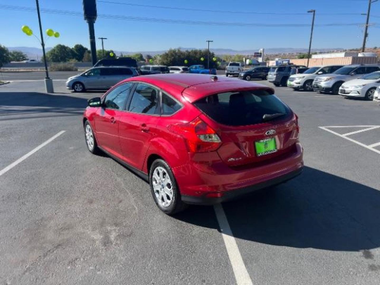 2012 Candy Red Metallic Tinted Clearcoat /Charcoal Black w/Warm Steel Surround Ford Focus SE (1FAHP3K27CL) with an 2L I-4 gasoline direct injection engine, Automatic transmission, located at 1865 East Red Hills Pkwy, St. George, 84770, (435) 628-0023, 37.120850, -113.543640 - We specialize in helping ALL people get the best financing available. No matter your credit score, good, bad or none we can get you an amazing rate. Had a bankruptcy, divorce, or repossessions? We give you the green light to get your credit back on the road. Low down and affordable payments that fit - Photo#4