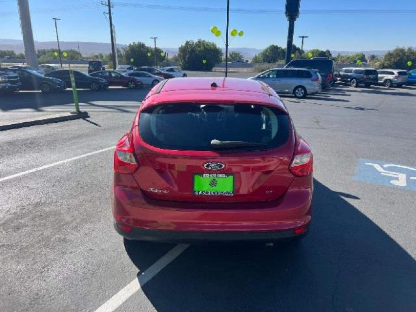 2012 Candy Red Metallic Tinted Clearcoat /Charcoal Black w/Warm Steel Surround Ford Focus SE (1FAHP3K27CL) with an 2L I-4 gasoline direct injection engine, Automatic transmission, located at 1865 East Red Hills Pkwy, St. George, 84770, (435) 628-0023, 37.120850, -113.543640 - We specialize in helping ALL people get the best financing available. No matter your credit score, good, bad or none we can get you an amazing rate. Had a bankruptcy, divorce, or repossessions? We give you the green light to get your credit back on the road. Low down and affordable payments that fit - Photo#5