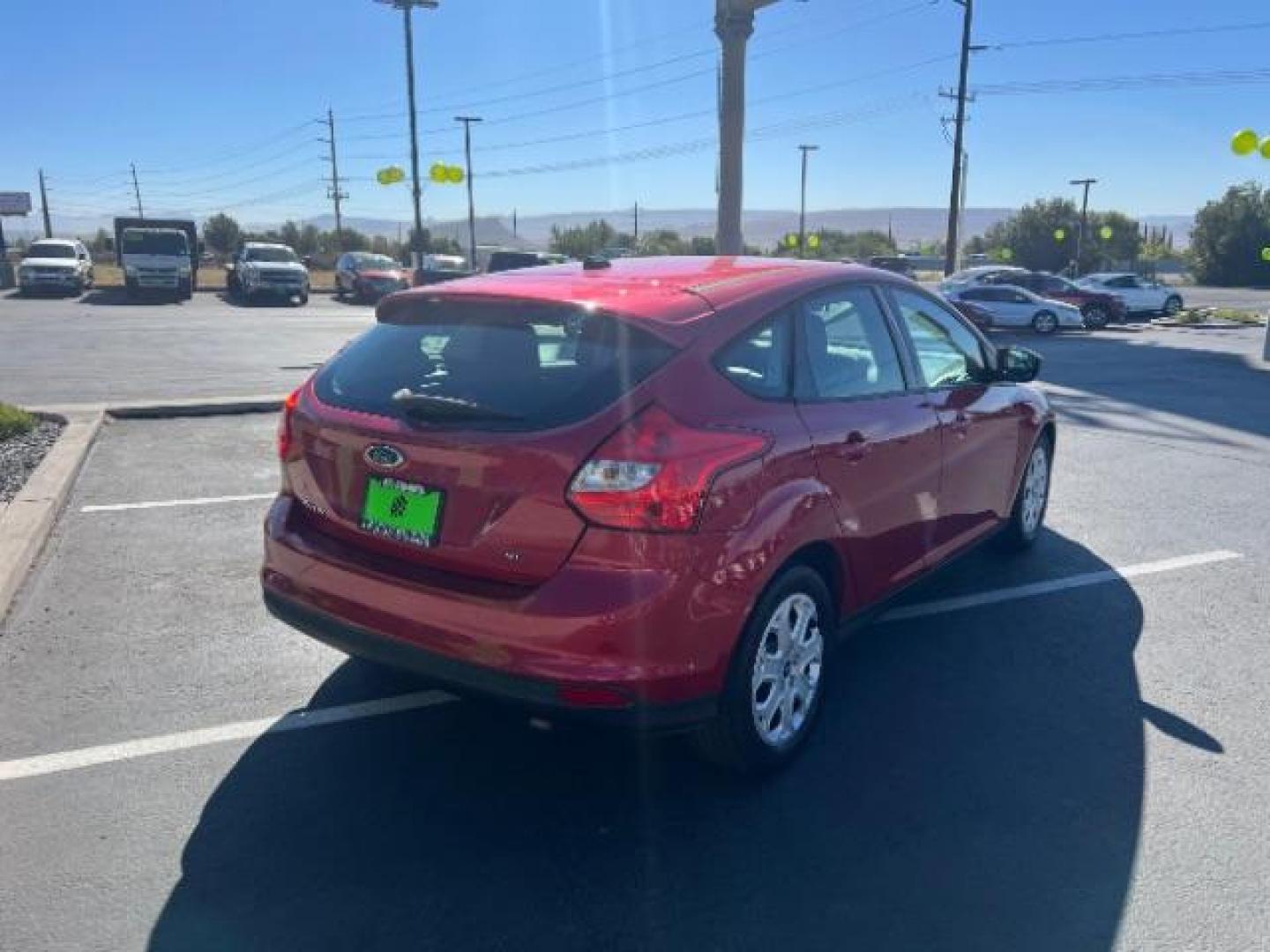 2012 Candy Red Metallic Tinted Clearcoat /Charcoal Black w/Warm Steel Surround Ford Focus SE (1FAHP3K27CL) with an 2L I-4 gasoline direct injection engine, Automatic transmission, located at 1865 East Red Hills Pkwy, St. George, 84770, (435) 628-0023, 37.120850, -113.543640 - We specialize in helping ALL people get the best financing available. No matter your credit score, good, bad or none we can get you an amazing rate. Had a bankruptcy, divorce, or repossessions? We give you the green light to get your credit back on the road. Low down and affordable payments that fit - Photo#6