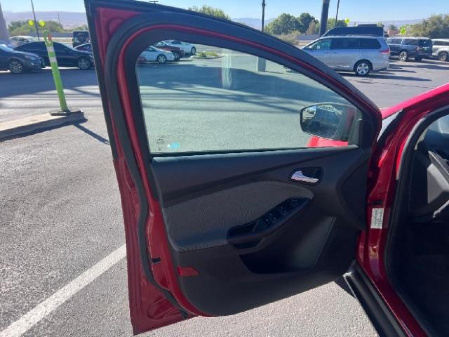 2012 Candy Red Metallic Tinted Clearcoat /Charcoal Black w/Warm Steel Surround Ford Focus SE (1FAHP3K27CL) with an 2L I-4 gasoline direct injection engine, Automatic transmission, located at 1865 East Red Hills Pkwy, St. George, 84770, (435) 628-0023, 37.120850, -113.543640 - We specialize in helping ALL people get the best financing available. No matter your credit score, good, bad or none we can get you an amazing rate. Had a bankruptcy, divorce, or repossessions? We give you the green light to get your credit back on the road. Low down and affordable payments that fit - Photo#12