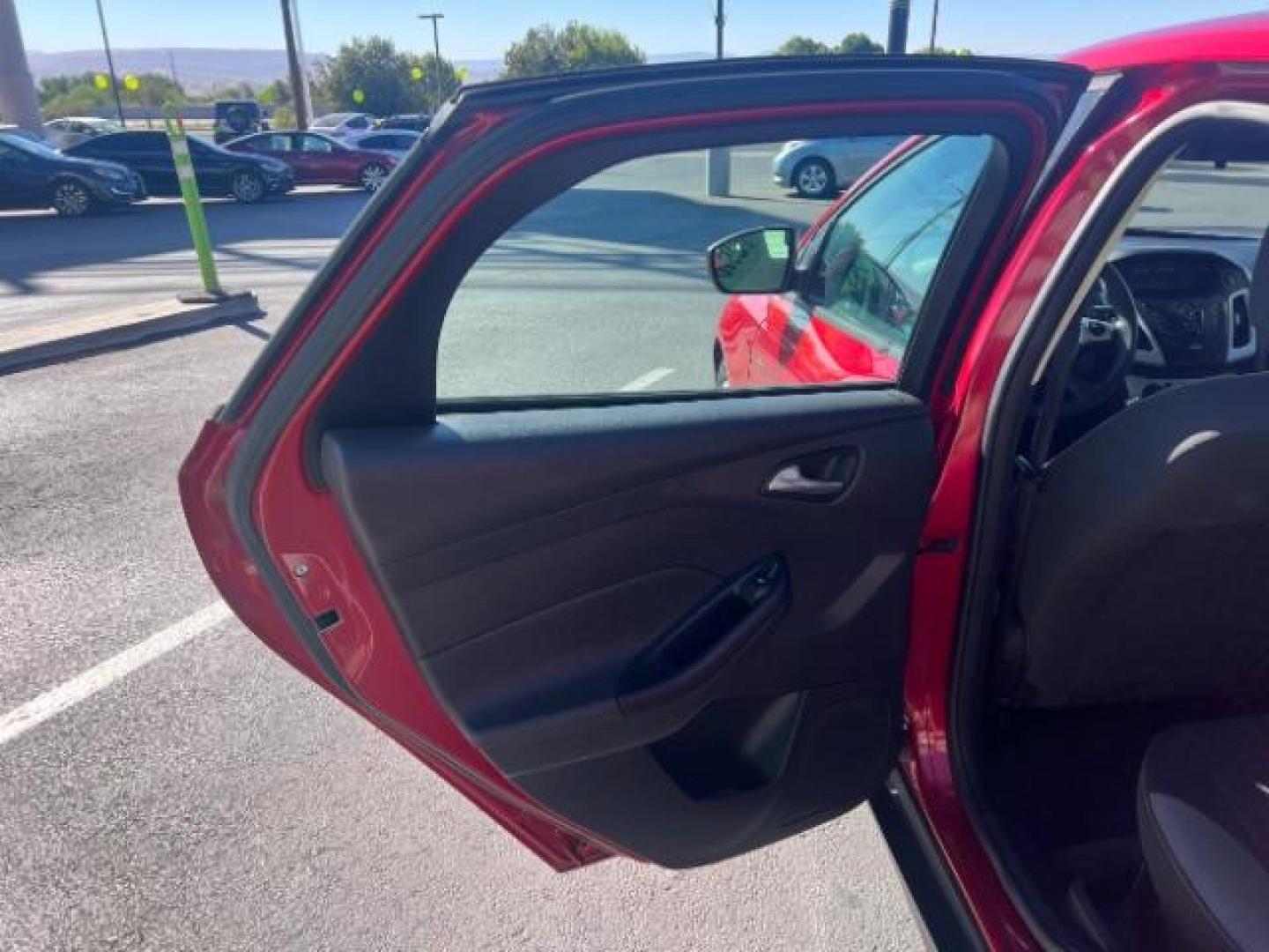 2012 Candy Red Metallic Tinted Clearcoat /Charcoal Black w/Warm Steel Surround Ford Focus SE (1FAHP3K27CL) with an 2L I-4 gasoline direct injection engine, Automatic transmission, located at 1865 East Red Hills Pkwy, St. George, 84770, (435) 628-0023, 37.120850, -113.543640 - We specialize in helping ALL people get the best financing available. No matter your credit score, good, bad or none we can get you an amazing rate. Had a bankruptcy, divorce, or repossessions? We give you the green light to get your credit back on the road. Low down and affordable payments that fit - Photo#20