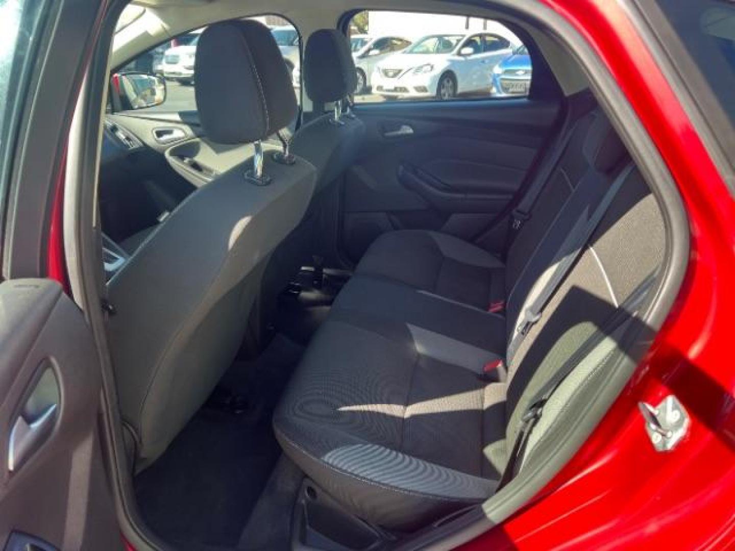 2012 Candy Red Metallic Tinted Clearcoat /Charcoal Black w/Warm Steel Surround Ford Focus SE (1FAHP3K27CL) with an 2L I-4 gasoline direct injection engine, Automatic transmission, located at 1865 East Red Hills Pkwy, St. George, 84770, (435) 628-0023, 37.120850, -113.543640 - We specialize in helping ALL people get the best financing available. No matter your credit score, good, bad or none we can get you an amazing rate. Had a bankruptcy, divorce, or repossessions? We give you the green light to get your credit back on the road. Low down and affordable payments that fit - Photo#21