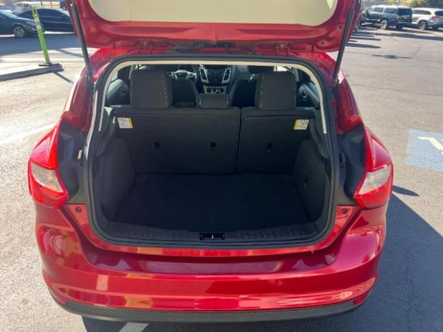 2012 Candy Red Metallic Tinted Clearcoat /Charcoal Black w/Warm Steel Surround Ford Focus SE (1FAHP3K27CL) with an 2L I-4 gasoline direct injection engine, Automatic transmission, located at 1865 East Red Hills Pkwy, St. George, 84770, (435) 628-0023, 37.120850, -113.543640 - We specialize in helping ALL people get the best financing available. No matter your credit score, good, bad or none we can get you an amazing rate. Had a bankruptcy, divorce, or repossessions? We give you the green light to get your credit back on the road. Low down and affordable payments that fit - Photo#23