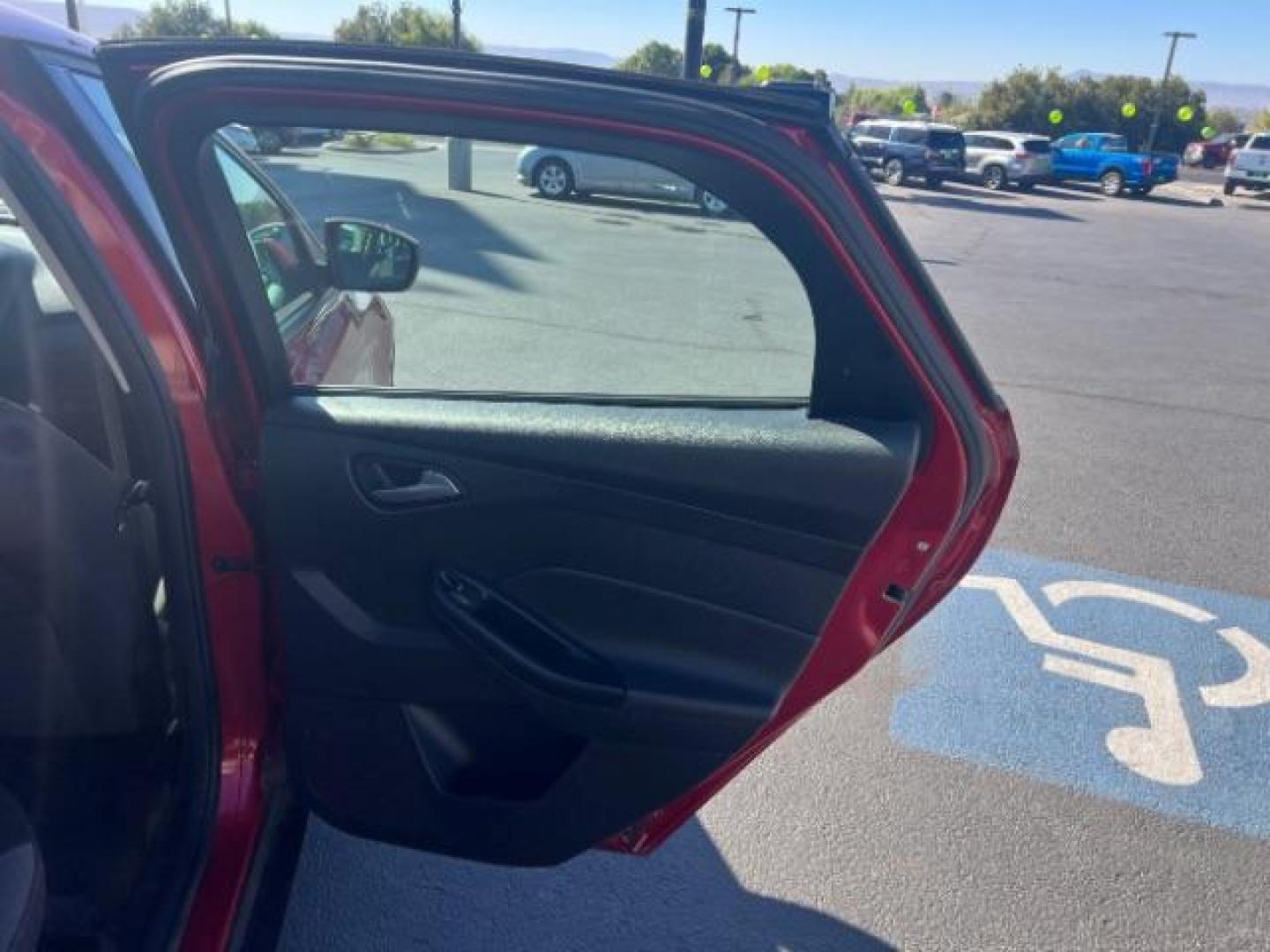 2012 Candy Red Metallic Tinted Clearcoat /Charcoal Black w/Warm Steel Surround Ford Focus SE (1FAHP3K27CL) with an 2L I-4 gasoline direct injection engine, Automatic transmission, located at 1865 East Red Hills Pkwy, St. George, 84770, (435) 628-0023, 37.120850, -113.543640 - We specialize in helping ALL people get the best financing available. No matter your credit score, good, bad or none we can get you an amazing rate. Had a bankruptcy, divorce, or repossessions? We give you the green light to get your credit back on the road. Low down and affordable payments that fit - Photo#25