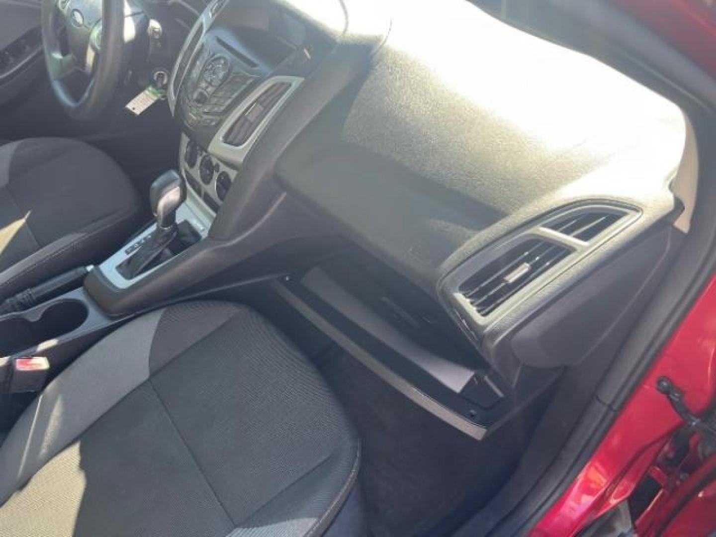 2012 Candy Red Metallic Tinted Clearcoat /Charcoal Black w/Warm Steel Surround Ford Focus SE (1FAHP3K27CL) with an 2L I-4 gasoline direct injection engine, Automatic transmission, located at 1865 East Red Hills Pkwy, St. George, 84770, (435) 628-0023, 37.120850, -113.543640 - We specialize in helping ALL people get the best financing available. No matter your credit score, good, bad or none we can get you an amazing rate. Had a bankruptcy, divorce, or repossessions? We give you the green light to get your credit back on the road. Low down and affordable payments that fit - Photo#29