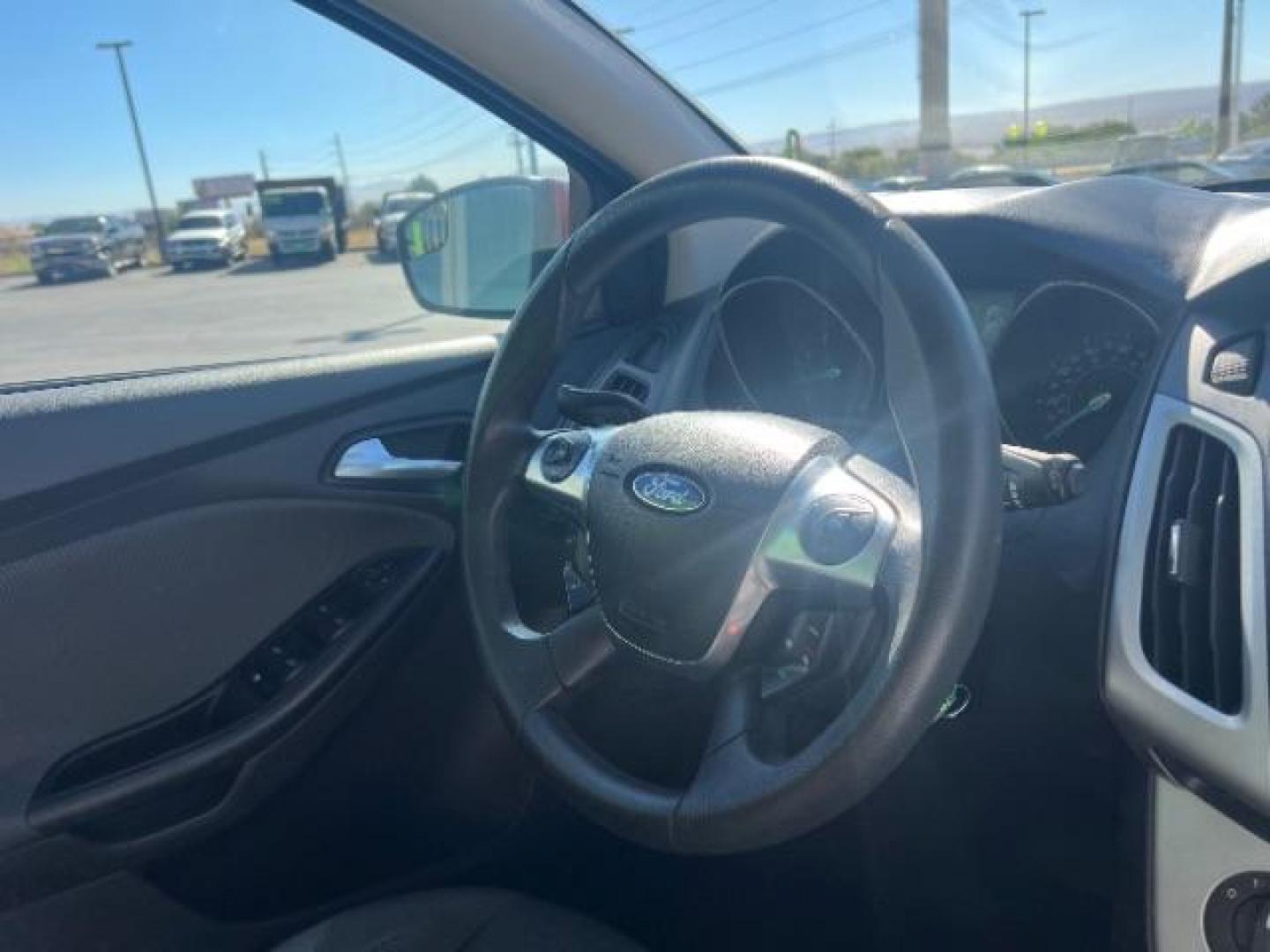 2012 Candy Red Metallic Tinted Clearcoat /Charcoal Black w/Warm Steel Surround Ford Focus SE (1FAHP3K27CL) with an 2L I-4 gasoline direct injection engine, Automatic transmission, located at 1865 East Red Hills Pkwy, St. George, 84770, (435) 628-0023, 37.120850, -113.543640 - We specialize in helping ALL people get the best financing available. No matter your credit score, good, bad or none we can get you an amazing rate. Had a bankruptcy, divorce, or repossessions? We give you the green light to get your credit back on the road. Low down and affordable payments that fit - Photo#30