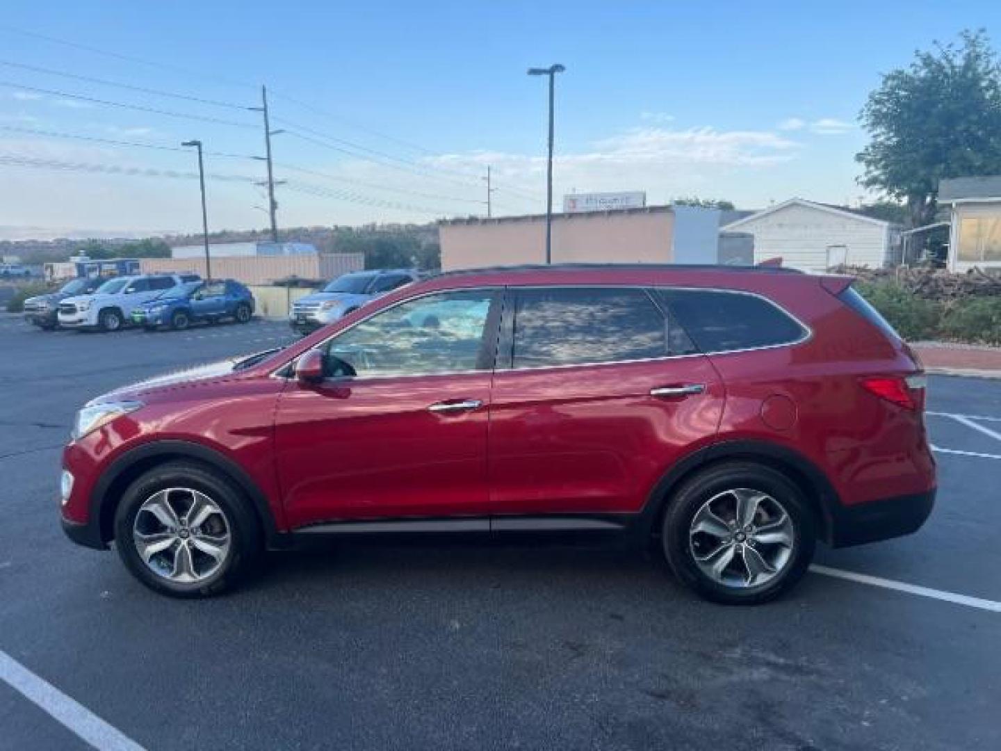 2016 Regal Red Pearl /Gray, cloth Hyundai Santa Fe SE AWD (KM8SMDHF9GU) with an 3.3L V6 DOHC 24V engine, 6-Speed Automatic transmission, located at 1865 East Red Hills Pkwy, St. George, 84770, (435) 628-0023, 37.120850, -113.543640 - We specialize in helping ALL people get the best financing available. No matter your credit score, good, bad or none we can get you an amazing rate. Had a bankruptcy, divorce, or repossessions? We give you the green light to get your credit back on the road. Low down and affordable payments that fit - Photo#3