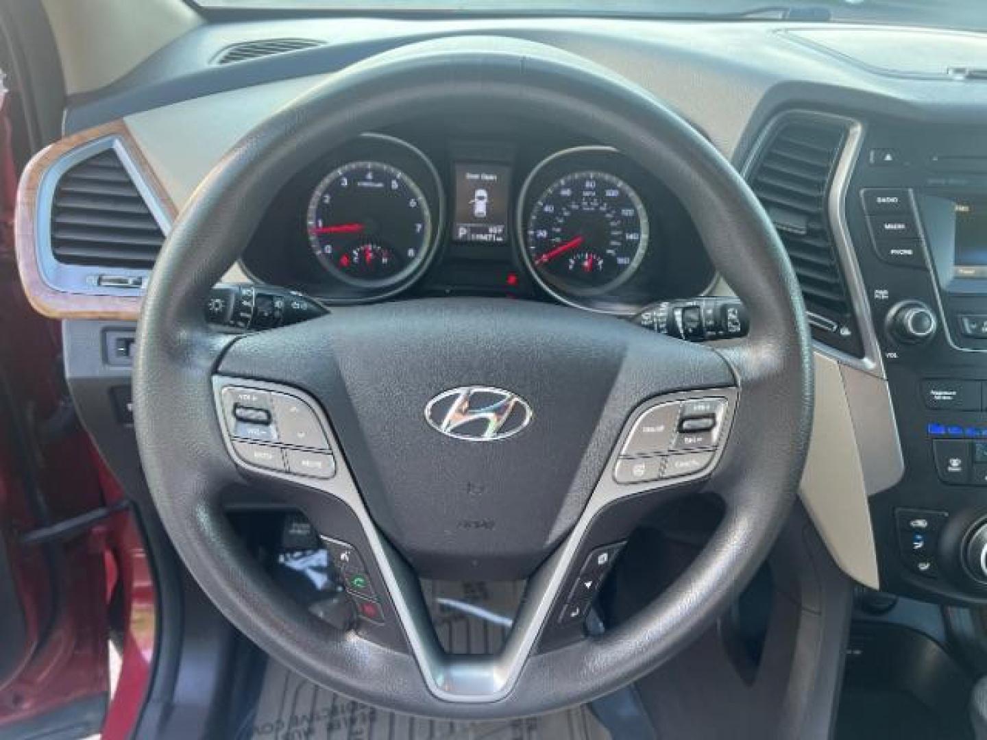 2016 Regal Red Pearl /Gray, cloth Hyundai Santa Fe SE AWD (KM8SMDHF9GU) with an 3.3L V6 DOHC 24V engine, 6-Speed Automatic transmission, located at 1865 East Red Hills Pkwy, St. George, 84770, (435) 628-0023, 37.120850, -113.543640 - We specialize in helping ALL people get the best financing available. No matter your credit score, good, bad or none we can get you an amazing rate. Had a bankruptcy, divorce, or repossessions? We give you the green light to get your credit back on the road. Low down and affordable payments that fit - Photo#15