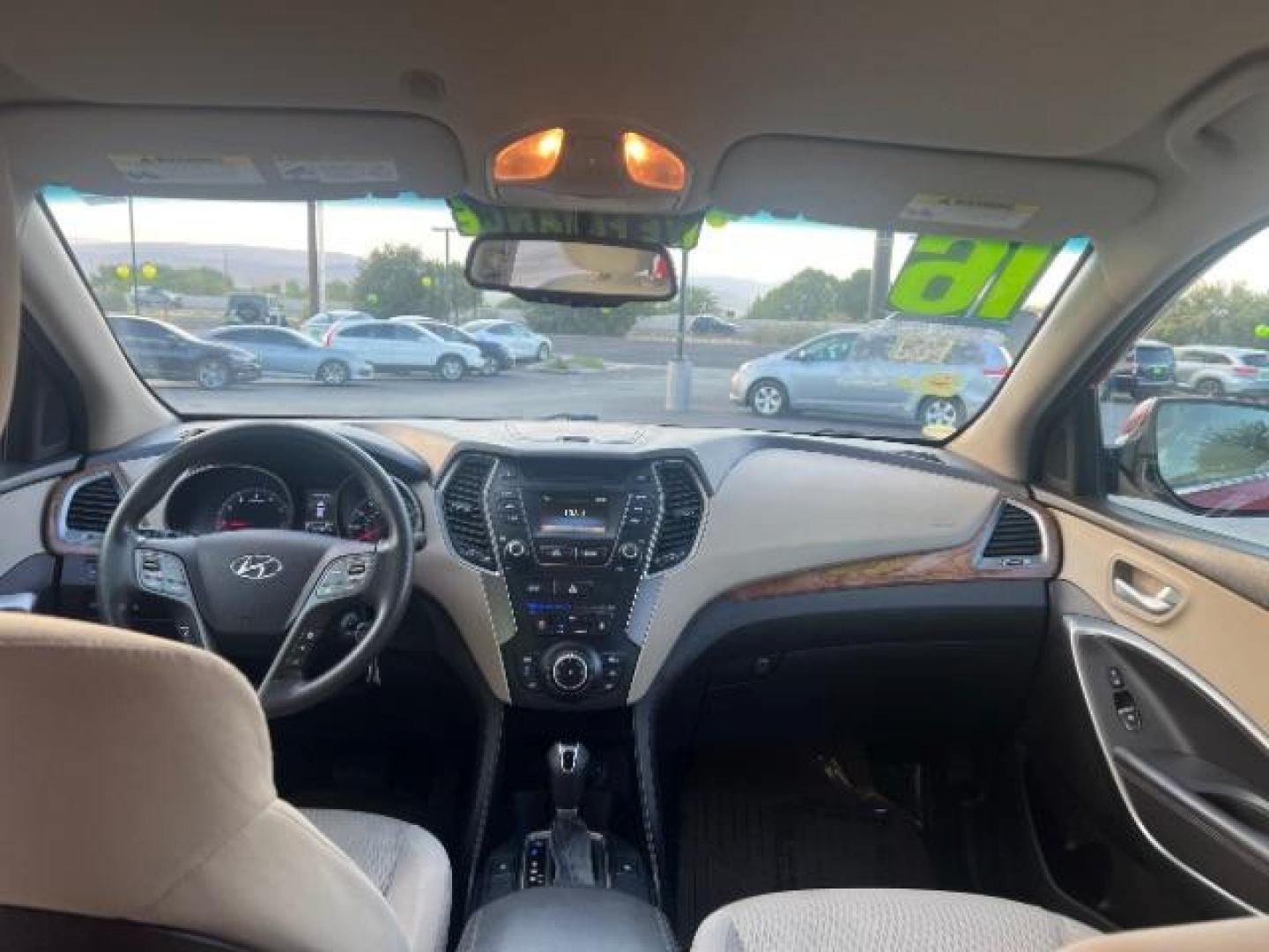 2016 Regal Red Pearl /Gray, cloth Hyundai Santa Fe SE AWD (KM8SMDHF9GU) with an 3.3L V6 DOHC 24V engine, 6-Speed Automatic transmission, located at 1865 East Red Hills Pkwy, St. George, 84770, (435) 628-0023, 37.120850, -113.543640 - We specialize in helping ALL people get the best financing available. No matter your credit score, good, bad or none we can get you an amazing rate. Had a bankruptcy, divorce, or repossessions? We give you the green light to get your credit back on the road. Low down and affordable payments that fit - Photo#23