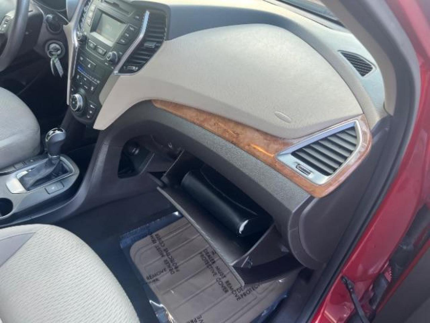 2016 Regal Red Pearl /Gray, cloth Hyundai Santa Fe SE AWD (KM8SMDHF9GU) with an 3.3L V6 DOHC 24V engine, 6-Speed Automatic transmission, located at 1865 East Red Hills Pkwy, St. George, 84770, (435) 628-0023, 37.120850, -113.543640 - We specialize in helping ALL people get the best financing available. No matter your credit score, good, bad or none we can get you an amazing rate. Had a bankruptcy, divorce, or repossessions? We give you the green light to get your credit back on the road. Low down and affordable payments that fit - Photo#32