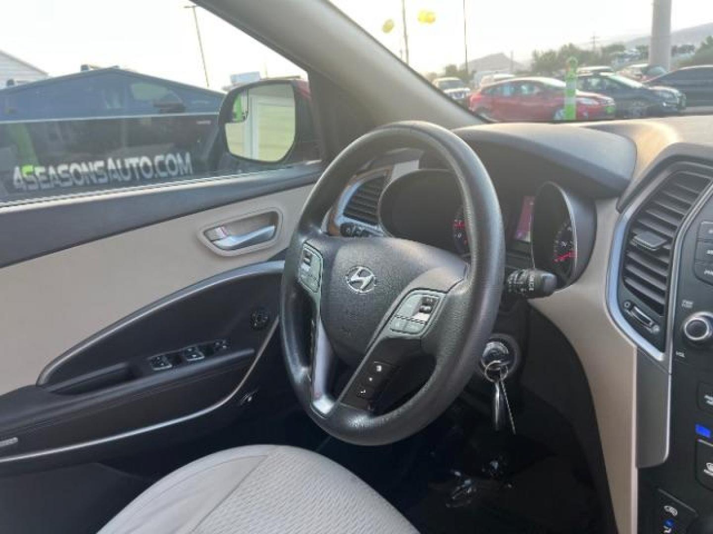 2016 Regal Red Pearl /Gray, cloth Hyundai Santa Fe SE AWD (KM8SMDHF9GU) with an 3.3L V6 DOHC 24V engine, 6-Speed Automatic transmission, located at 1865 East Red Hills Pkwy, St. George, 84770, (435) 628-0023, 37.120850, -113.543640 - We specialize in helping ALL people get the best financing available. No matter your credit score, good, bad or none we can get you an amazing rate. Had a bankruptcy, divorce, or repossessions? We give you the green light to get your credit back on the road. Low down and affordable payments that fit - Photo#33