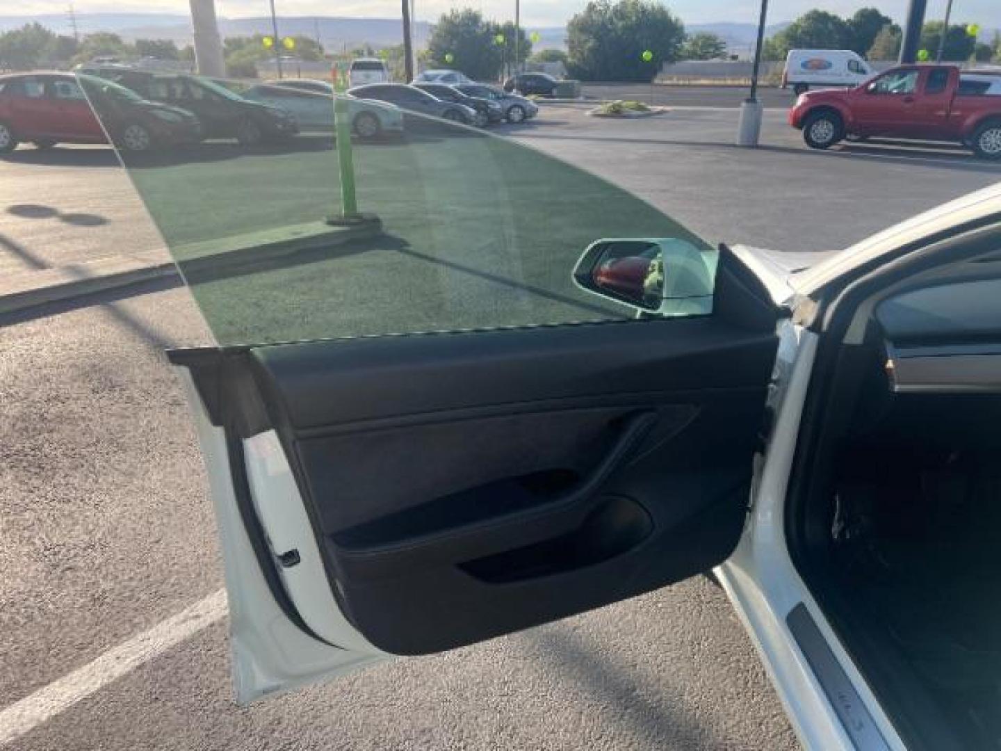 2020 Pearl White Multi-Coat /Black Tesla Model 3 Long Range Dual Motor All-Wheel Drive (5YJ3E1EBXLF) with an ELECTRIC engine, Continuously Variable Transmission transmission, located at 1865 East Red Hills Pkwy, St. George, 84770, (435) 628-0023, 37.120850, -113.543640 - ****Price includes $4k IRS EV REBATE**** We are approved to file the EV rebate directly with the IRS. We recived the funds in 7 days and take credit off the price of car. Check with IRS EV website to be sure you qualify. This program ends Sept 30th so ACT FAST! This Tesla is an AWD Long Range. FUL - Photo#14