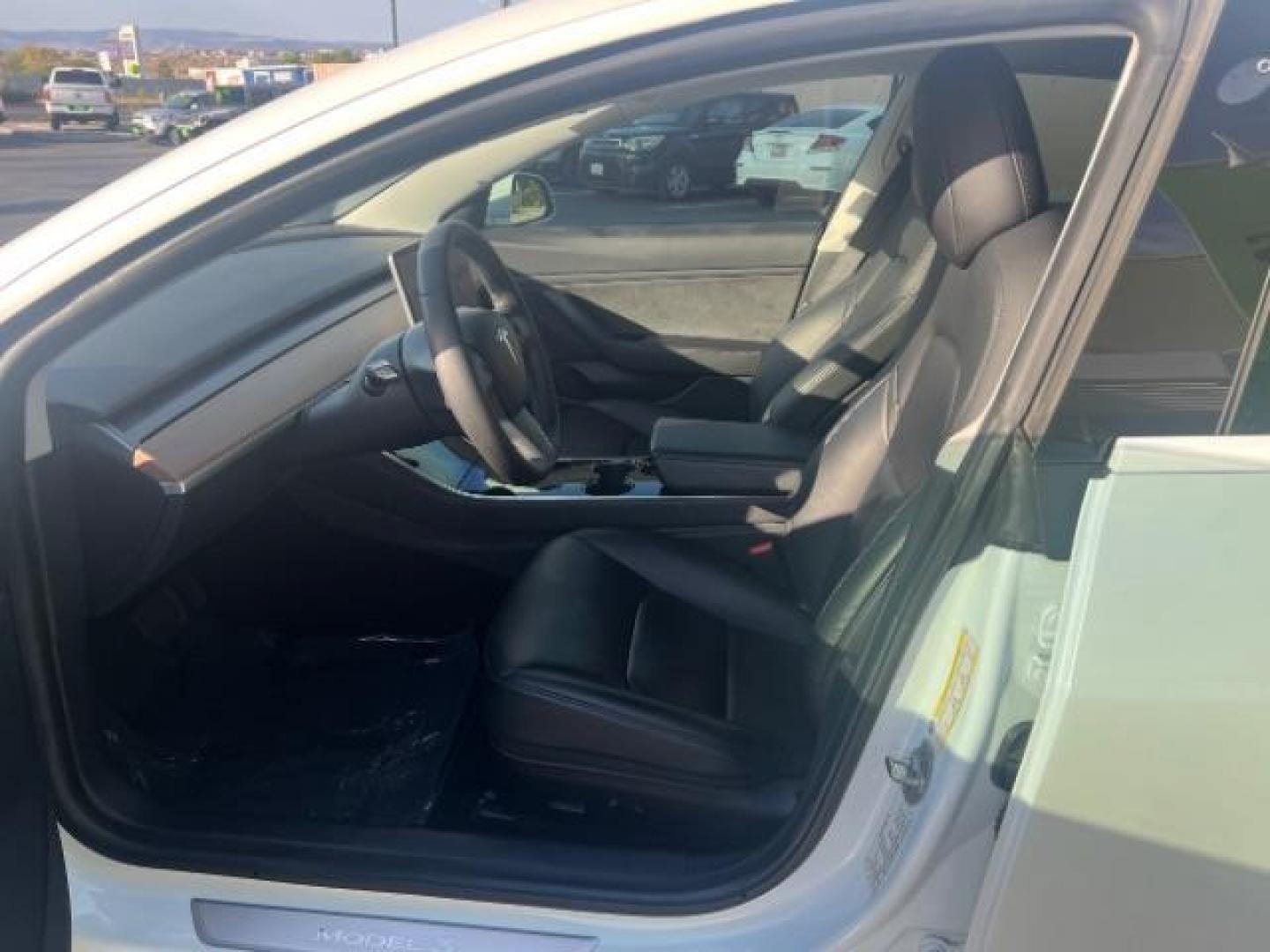 2020 Pearl White Multi-Coat /Black Tesla Model 3 Long Range Dual Motor All-Wheel Drive (5YJ3E1EBXLF) with an ELECTRIC engine, Continuously Variable Transmission transmission, located at 1865 East Red Hills Pkwy, St. George, 84770, (435) 628-0023, 37.120850, -113.543640 - ****Price includes $4k IRS EV REBATE**** We are approved to file the EV rebate directly with the IRS. We recived the funds in 7 days and take credit off the price of car. Check with IRS EV website to be sure you qualify. This program ends Sept 30th so ACT FAST! This Tesla is an AWD Long Range. FUL - Photo#16