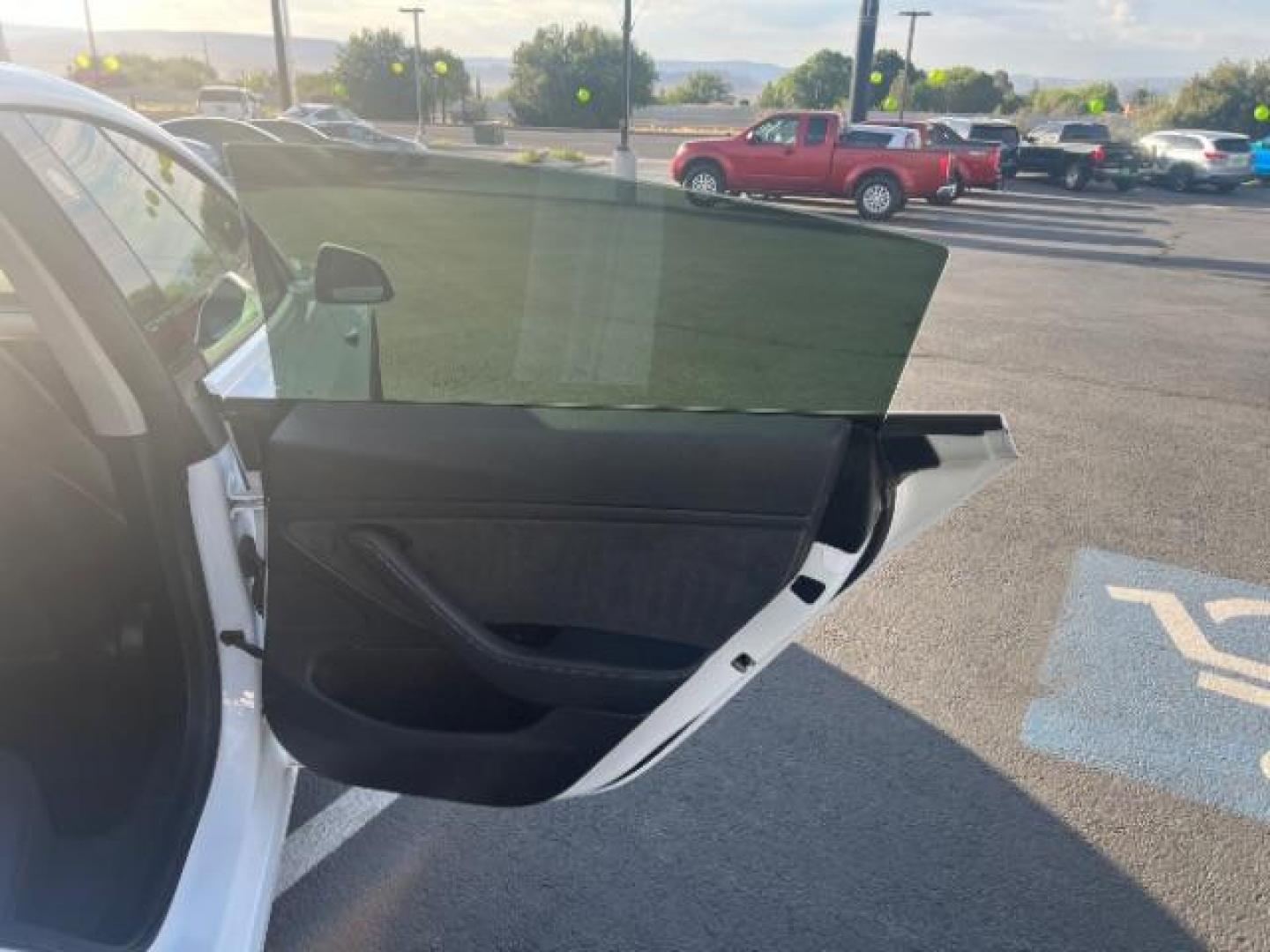 2020 Pearl White Multi-Coat /Black Tesla Model 3 Long Range Dual Motor All-Wheel Drive (5YJ3E1EBXLF) with an ELECTRIC engine, Continuously Variable Transmission transmission, located at 1865 East Red Hills Pkwy, St. George, 84770, (435) 628-0023, 37.120850, -113.543640 - ****Price includes $4k IRS EV REBATE**** We are approved to file the EV rebate directly with the IRS. We recived the funds in 7 days and take credit off the price of car. Check with IRS EV website to be sure you qualify. This program ends Sept 30th so ACT FAST! This Tesla is an AWD Long Range. FUL - Photo#25