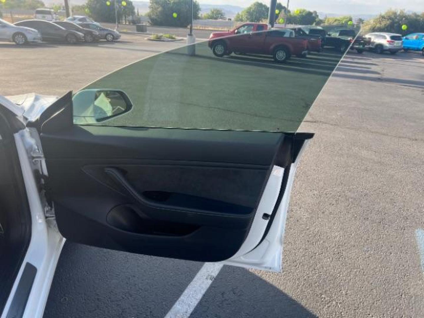 2020 Pearl White Multi-Coat /Black Tesla Model 3 Long Range Dual Motor All-Wheel Drive (5YJ3E1EBXLF) with an ELECTRIC engine, Continuously Variable Transmission transmission, located at 1865 East Red Hills Pkwy, St. George, 84770, (435) 628-0023, 37.120850, -113.543640 - ****Price includes $4k IRS EV REBATE**** We are approved to file the EV rebate directly with the IRS. We recived the funds in 7 days and take credit off the price of car. Check with IRS EV website to be sure you qualify. This program ends Sept 30th so ACT FAST! This Tesla is an AWD Long Range. FUL - Photo#27