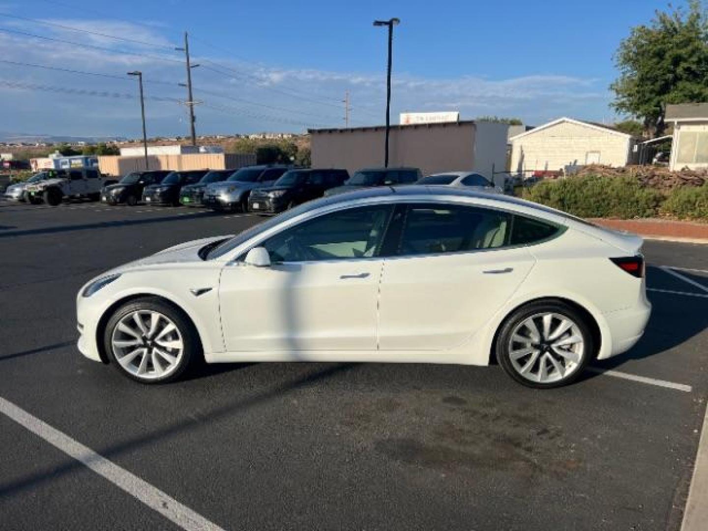 2018 Pearl White Multi-Coat /White Tesla Model 3 Long Range (5YJ3E1EB0JF) with an ELECTRIC engine, Continuously Variable Transmission transmission, located at 1865 East Red Hills Pkwy, St. George, 84770, (435) 628-0023, 37.120850, -113.543640 - ****Price includes $4k IRS EV REBATE**** We are approved to file the EV rebate directly with the IRS. We recived the funds in 7 days and take credit off the price of car. Check with IRS EV website to be sure you qualify. This program ends Sept 30th so ACT FAST! This Tesla is an AWD Long Range. Whi - Photo#5