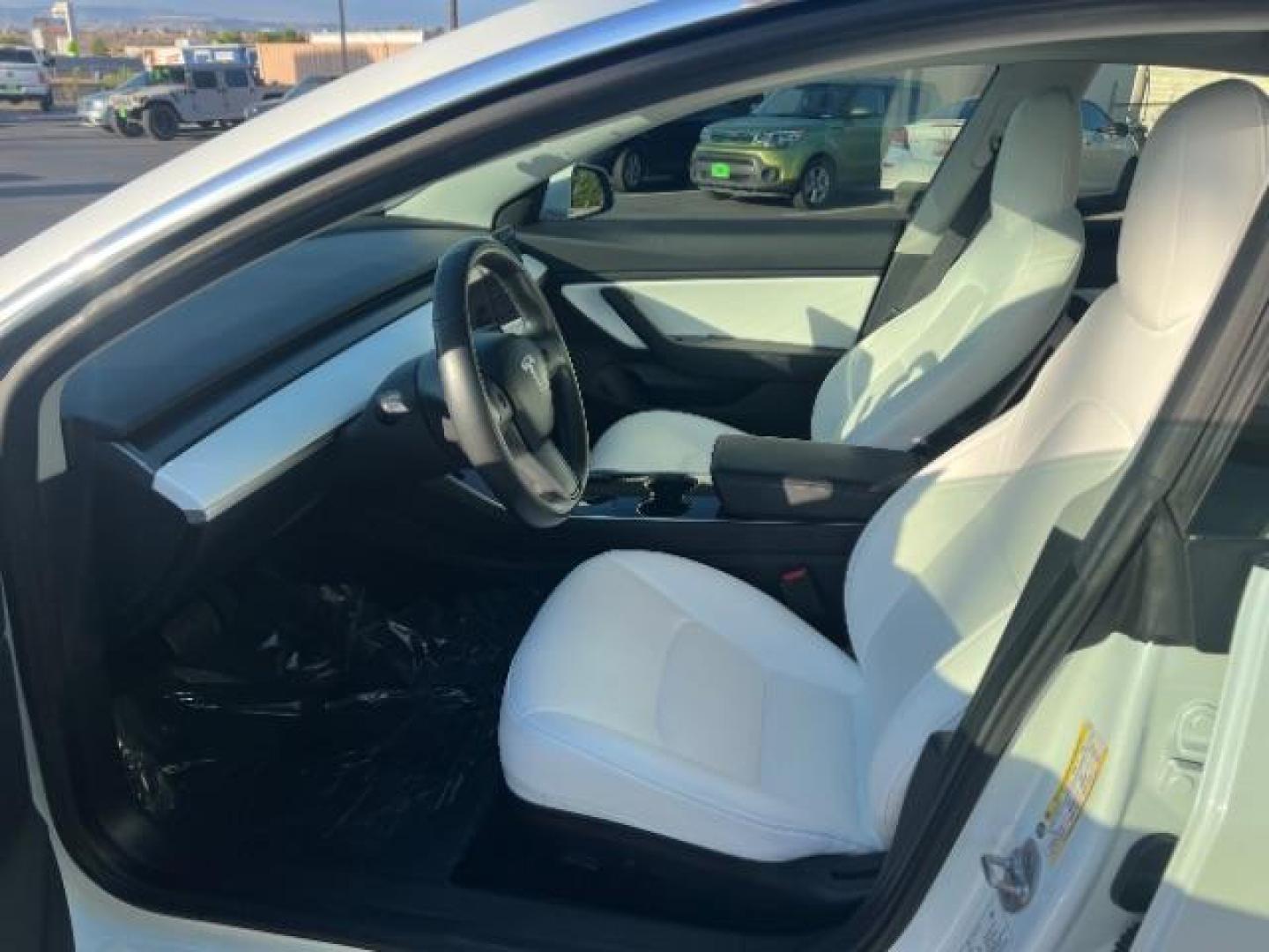 2018 Pearl White Multi-Coat /White Tesla Model 3 Long Range (5YJ3E1EB0JF) with an ELECTRIC engine, Continuously Variable Transmission transmission, located at 1865 East Red Hills Pkwy, St. George, 84770, (435) 628-0023, 37.120850, -113.543640 - ****Price includes $4k IRS EV REBATE**** We are approved to file the EV rebate directly with the IRS. We recived the funds in 7 days and take credit off the price of car. Check with IRS EV website to be sure you qualify. This program ends Sept 30th so ACT FAST! This Tesla is an AWD Long Range. Whi - Photo#16