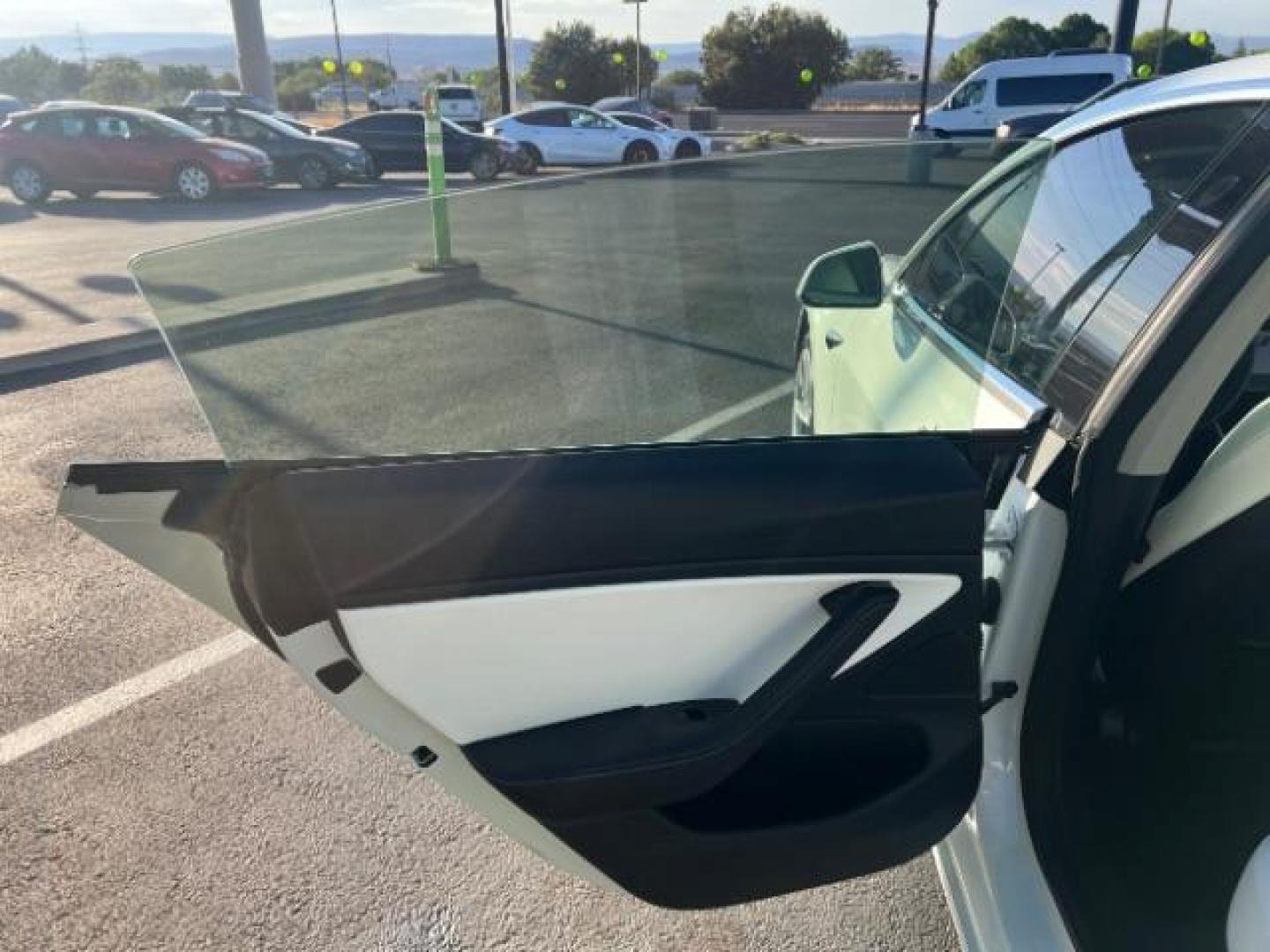 2018 Pearl White Multi-Coat /White Tesla Model 3 Long Range (5YJ3E1EB0JF) with an ELECTRIC engine, Continuously Variable Transmission transmission, located at 1865 East Red Hills Pkwy, St. George, 84770, (435) 628-0023, 37.120850, -113.543640 - ****Price includes $4k IRS EV REBATE**** We are approved to file the EV rebate directly with the IRS. We recived the funds in 7 days and take credit off the price of car. Check with IRS EV website to be sure you qualify. This program ends Sept 30th so ACT FAST! This Tesla is an AWD Long Range. Whi - Photo#20