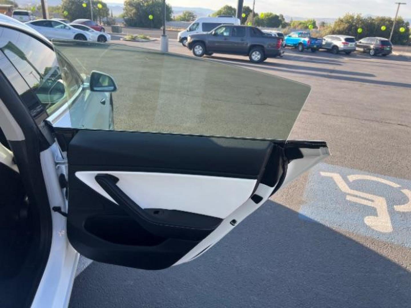 2018 Pearl White Multi-Coat /White Tesla Model 3 Long Range (5YJ3E1EB0JF) with an ELECTRIC engine, Continuously Variable Transmission transmission, located at 1865 East Red Hills Pkwy, St. George, 84770, (435) 628-0023, 37.120850, -113.543640 - ****Price includes $4k IRS EV REBATE**** We are approved to file the EV rebate directly with the IRS. We recived the funds in 7 days and take credit off the price of car. Check with IRS EV website to be sure you qualify. This program ends Sept 30th so ACT FAST! This Tesla is an AWD Long Range. Whi - Photo#25