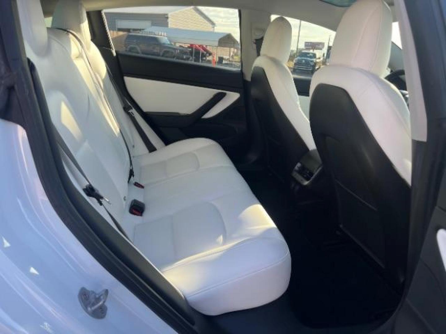 2018 Pearl White Multi-Coat /White Tesla Model 3 Long Range (5YJ3E1EB0JF) with an ELECTRIC engine, Continuously Variable Transmission transmission, located at 1865 East Red Hills Pkwy, St. George, 84770, (435) 628-0023, 37.120850, -113.543640 - ****Price includes $4k IRS EV REBATE**** We are approved to file the EV rebate directly with the IRS. We recived the funds in 7 days and take credit off the price of car. Check with IRS EV website to be sure you qualify. This program ends Sept 30th so ACT FAST! This Tesla is an AWD Long Range. Whi - Photo#26