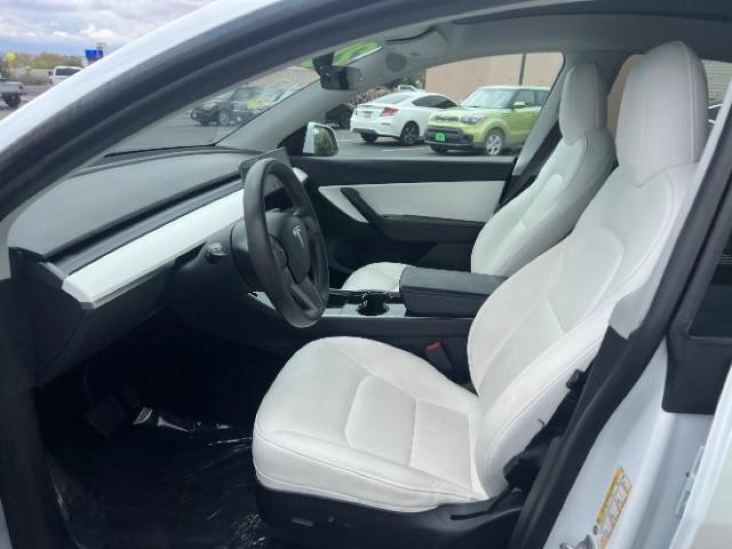 2020 Pearl White Multi-Coat /White/Black Tesla Model Y Long Range Dual Motor All-Wheel Drive (5YJYGDEE7LF) with an ELECTRIC engine, Continuously Variable Transmission transmission, located at 1865 East Red Hills Pkwy, St. George, 84770, (435) 628-0023, 37.120850, -113.543640 - ****Price includes $4k IRS EV REBATE**** We are approved to file the EV rebate directly with the IRS. We recived the funds in 7 days and take credit off the price of car. Check with IRS EV website to be sure you qualify. This program ends Sept 30th so ACT FAST! This Tesla is an AWD Long Range. Whi - Photo#16
