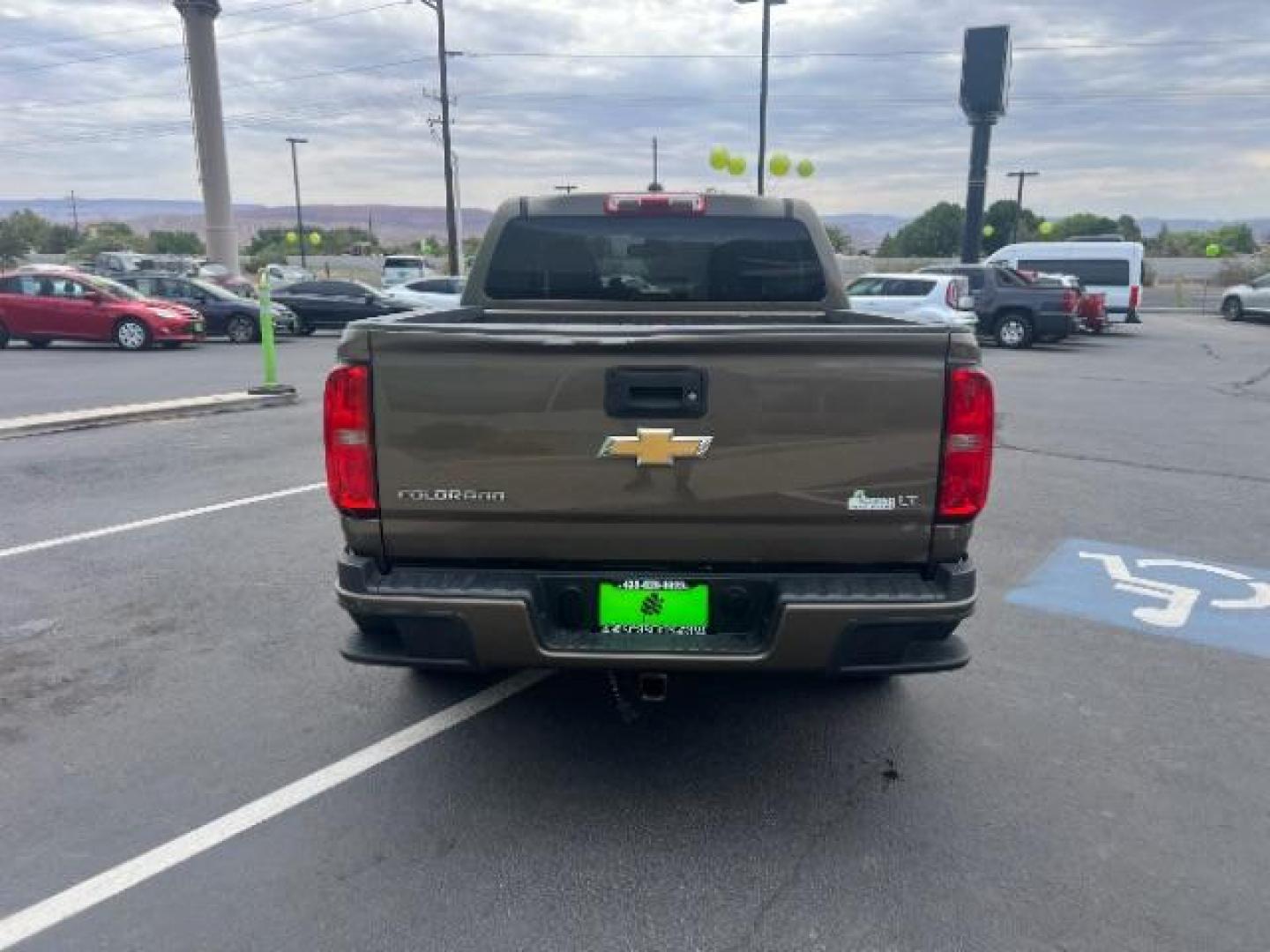 2016 Brownstone Metallic /Jet Black/Dark Ash Chevrolet Colorado LT (1GCGSCEA2G1) with an 2.5L I-4 gasoline direct injection engine, 6-Speed Automatic transmission, located at 940 North Main Street, Cedar City, UT, 84720, (435) 628-0023, 37.692936, -113.061897 - We specialize in helping ALL people get the best financing available. No matter your credit score, good, bad or none we can get you an amazing rate. Had a bankruptcy, divorce, or repossessions? We give you the green light to get your credit back on the road. Low down and affordable payments that fit - Photo#5