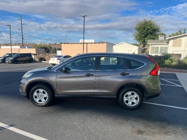 2015 Kona Coffee Metallic /Gray Honda CR-V LX (3CZRM3H38FG) with an 2.4L I-4 gasoline direct injection engine, Automatic transmission, located at 940 North Main Street, Cedar City, UT, 84720, (435) 628-0023, 37.692936, -113.061897 - We specialize in helping ALL people get the best financing available. No matter your credit score, good, bad or none we can get you an amazing rate. Had a bankruptcy, divorce, or repossessions? We give you the green light to get your credit back on the road. Low down and affordable payments that fit - Photo#3