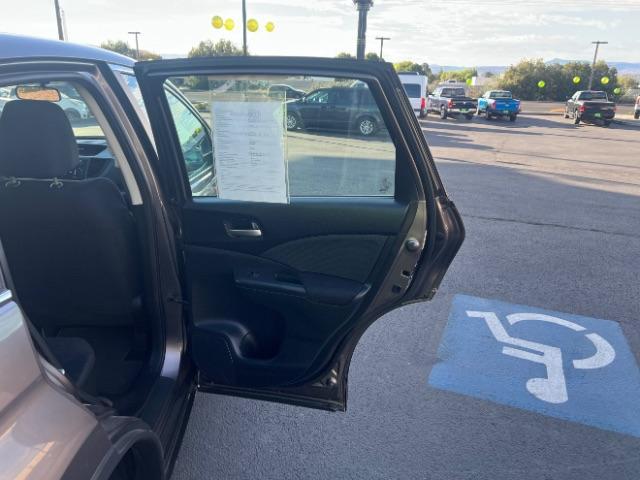 2015 Kona Coffee Metallic /Gray Honda CR-V LX (3CZRM3H38FG) with an 2.4L I-4 gasoline direct injection engine, Automatic transmission, located at 940 North Main Street, Cedar City, UT, 84720, (435) 628-0023, 37.692936, -113.061897 - We specialize in helping ALL people get the best financing available. No matter your credit score, good, bad or none we can get you an amazing rate. Had a bankruptcy, divorce, or repossessions? We give you the green light to get your credit back on the road. Low down and affordable payments that fit - Photo#25