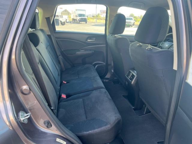 2015 Kona Coffee Metallic /Gray Honda CR-V LX (3CZRM3H38FG) with an 2.4L I-4 gasoline direct injection engine, Automatic transmission, located at 940 North Main Street, Cedar City, UT, 84720, (435) 628-0023, 37.692936, -113.061897 - We specialize in helping ALL people get the best financing available. No matter your credit score, good, bad or none we can get you an amazing rate. Had a bankruptcy, divorce, or repossessions? We give you the green light to get your credit back on the road. Low down and affordable payments that fit - Photo#26