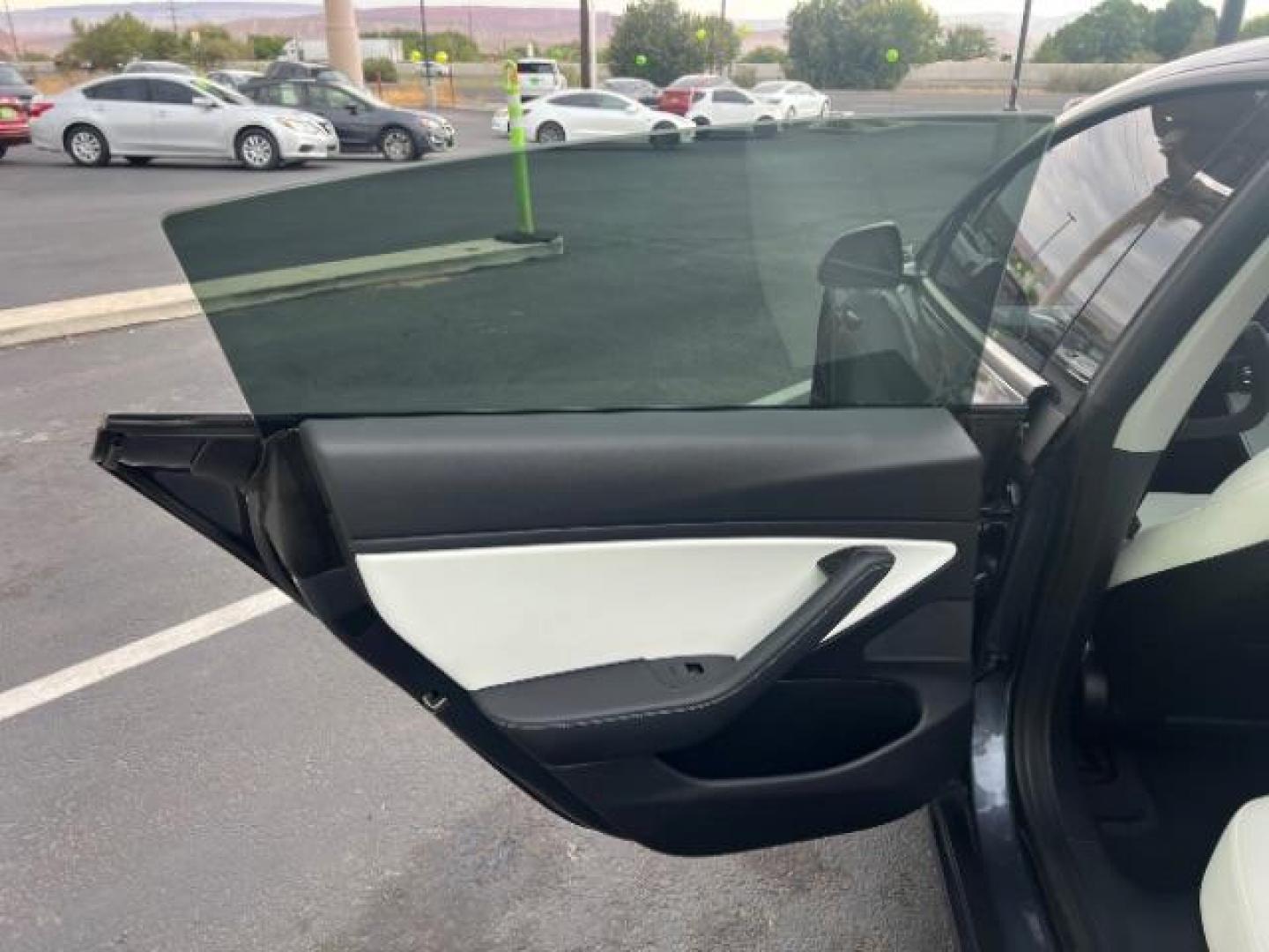 2018 Grey /White Tesla Model 3 Long Range (5YJ3E1EB6JF) with an ELECTRIC engine, Continuously Variable Transmission transmission, located at 1865 East Red Hills Pkwy, St. George, 84770, (435) 628-0023, 37.120850, -113.543640 - Photo#20
