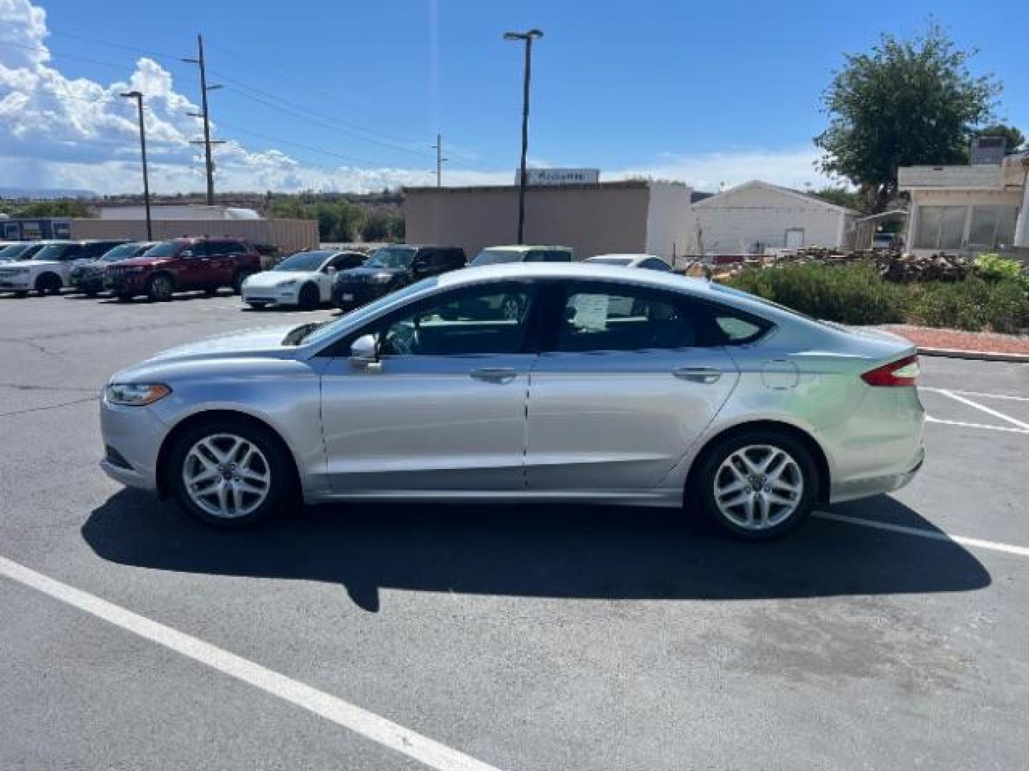 2016 Ingot Silver /Ebony Ford Fusion SE (3FA6P0H74GR) with an EcoBoost 1.5L I-4 gasoline direct injection engine, Automatic transmission, located at 1865 East Red Hills Pkwy, St. George, 84770, (435) 628-0023, 37.120850, -113.543640 - We specialize in helping ALL people get the best financing available. No matter your credit score, good, bad or none we can get you an amazing rate. Had a bankruptcy, divorce, or repossessions? We give you the green light to get your credit back on the road. Low down and affordable payments that fit - Photo#3