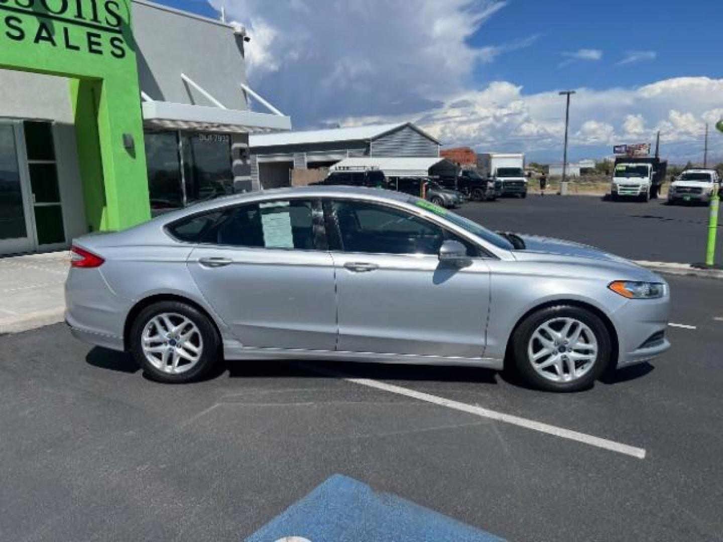 2016 Ingot Silver /Ebony Ford Fusion SE (3FA6P0H74GR) with an EcoBoost 1.5L I-4 gasoline direct injection engine, Automatic transmission, located at 1865 East Red Hills Pkwy, St. George, 84770, (435) 628-0023, 37.120850, -113.543640 - We specialize in helping ALL people get the best financing available. No matter your credit score, good, bad or none we can get you an amazing rate. Had a bankruptcy, divorce, or repossessions? We give you the green light to get your credit back on the road. Low down and affordable payments that fit - Photo#7