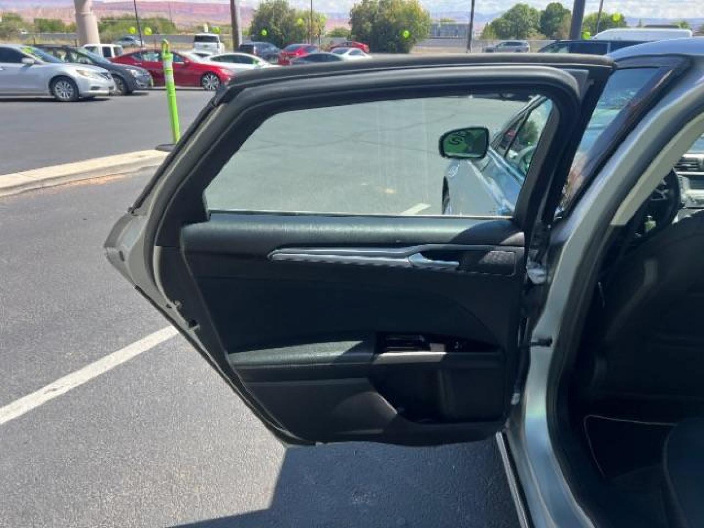 2016 Ingot Silver /Ebony Ford Fusion SE (3FA6P0H74GR) with an EcoBoost 1.5L I-4 gasoline direct injection engine, Automatic transmission, located at 1865 East Red Hills Pkwy, St. George, 84770, (435) 628-0023, 37.120850, -113.543640 - We specialize in helping ALL people get the best financing available. No matter your credit score, good, bad or none we can get you an amazing rate. Had a bankruptcy, divorce, or repossessions? We give you the green light to get your credit back on the road. Low down and affordable payments that fit - Photo#20