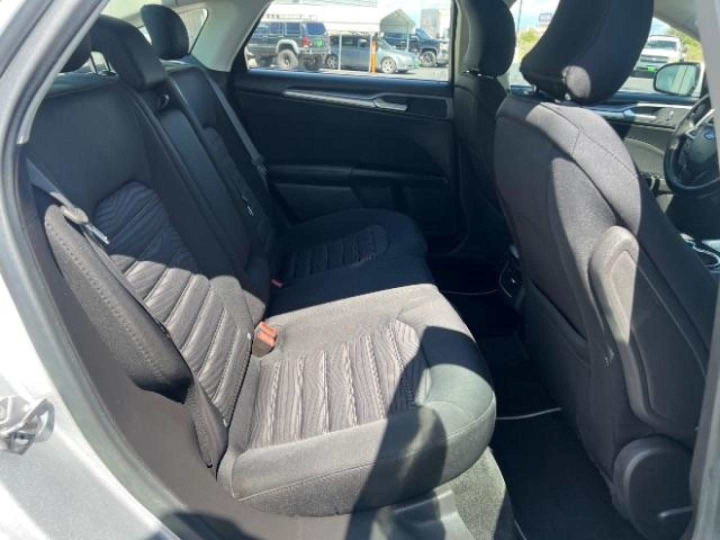 2016 Ingot Silver /Ebony Ford Fusion SE (3FA6P0H74GR) with an EcoBoost 1.5L I-4 gasoline direct injection engine, Automatic transmission, located at 1865 East Red Hills Pkwy, St. George, 84770, (435) 628-0023, 37.120850, -113.543640 - We specialize in helping ALL people get the best financing available. No matter your credit score, good, bad or none we can get you an amazing rate. Had a bankruptcy, divorce, or repossessions? We give you the green light to get your credit back on the road. Low down and affordable payments that fit - Photo#26