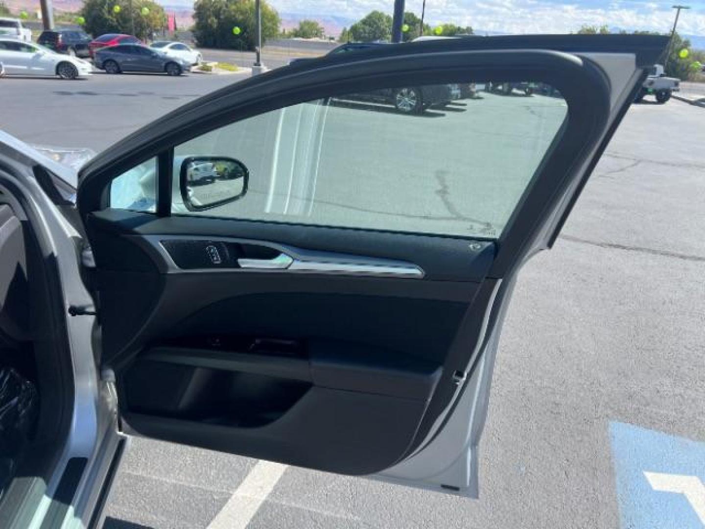 2016 Ingot Silver /Ebony Ford Fusion SE (3FA6P0H74GR) with an EcoBoost 1.5L I-4 gasoline direct injection engine, Automatic transmission, located at 1865 East Red Hills Pkwy, St. George, 84770, (435) 628-0023, 37.120850, -113.543640 - We specialize in helping ALL people get the best financing available. No matter your credit score, good, bad or none we can get you an amazing rate. Had a bankruptcy, divorce, or repossessions? We give you the green light to get your credit back on the road. Low down and affordable payments that fit - Photo#27