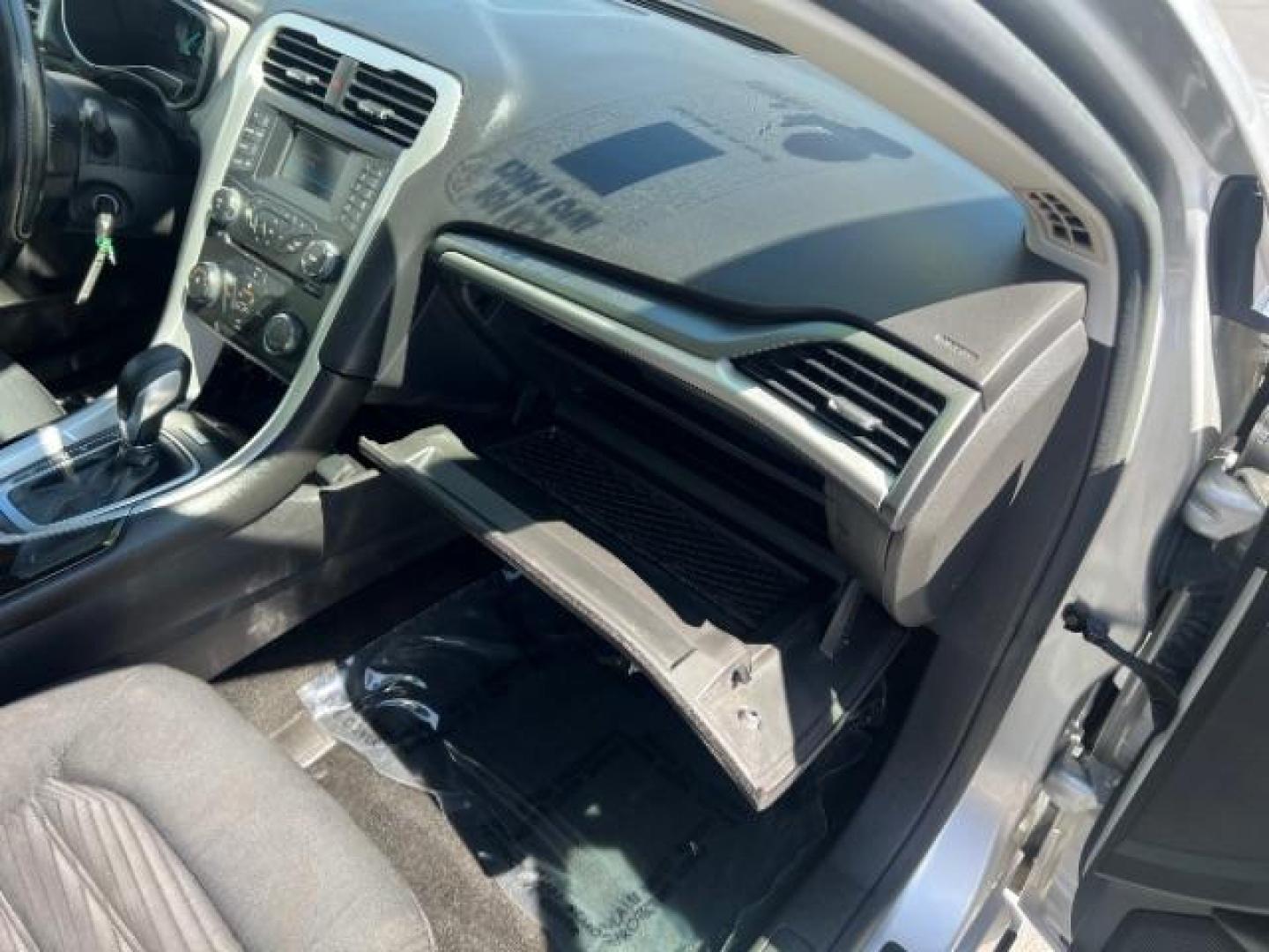 2016 Ingot Silver /Ebony Ford Fusion SE (3FA6P0H74GR) with an EcoBoost 1.5L I-4 gasoline direct injection engine, Automatic transmission, located at 1865 East Red Hills Pkwy, St. George, 84770, (435) 628-0023, 37.120850, -113.543640 - We specialize in helping ALL people get the best financing available. No matter your credit score, good, bad or none we can get you an amazing rate. Had a bankruptcy, divorce, or repossessions? We give you the green light to get your credit back on the road. Low down and affordable payments that fit - Photo#29