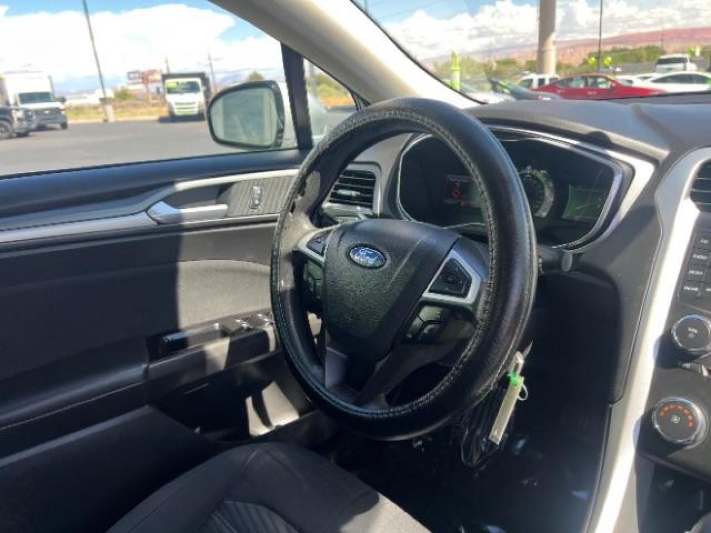 2016 Ingot Silver /Ebony Ford Fusion SE (3FA6P0H74GR) with an EcoBoost 1.5L I-4 gasoline direct injection engine, Automatic transmission, located at 1865 East Red Hills Pkwy, St. George, 84770, (435) 628-0023, 37.120850, -113.543640 - We specialize in helping ALL people get the best financing available. No matter your credit score, good, bad or none we can get you an amazing rate. Had a bankruptcy, divorce, or repossessions? We give you the green light to get your credit back on the road. Low down and affordable payments that fit - Photo#30