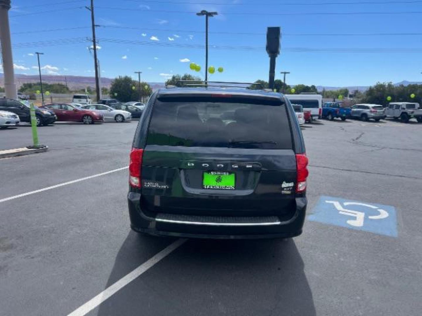 2014 Maximum Steel Metallic Clearcoat /Black Dodge Grand Caravan SXT (2C4RDGCG0ER) with an 3.6L V-6 DOHC engine, Automatic transmission, located at 940 North Main Street, Cedar City, UT, 84720, (435) 628-0023, 37.692936, -113.061897 - Photo#5