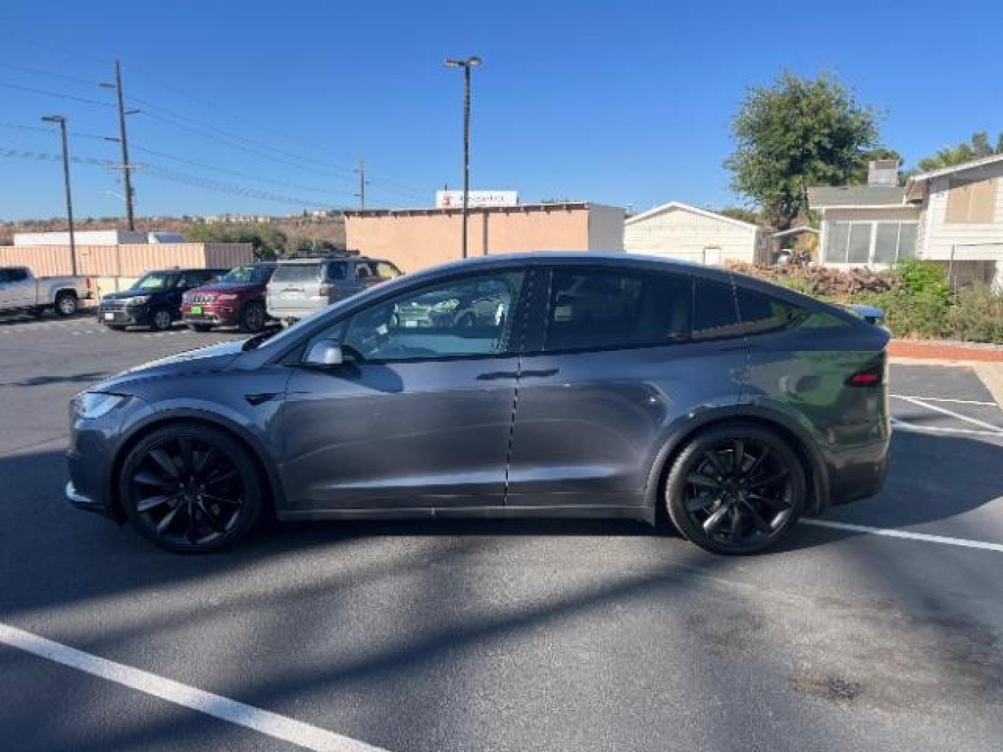 2022 Midnight Silver Metallic /White/Black Tesla Model X Plaid Tri Motor All-Wheel Drive (7SAXCBE65NF) with an ELECTRIC engine, Continuously Variable Transmission transmission, located at 1865 East Red Hills Pkwy, St. George, 84770, (435) 628-0023, 37.120850, -113.543640 - Beautiful Tesla Model X PLAID with 6 seat white interior. Brand new tires, 22' Turbine wheels, Auto pilot, Yoke steering wheel, Tow Package, Hepa air filter Full self driving with $99 month subscription, Super clean! Gets 280 on a full charge (90%) battery health. Has full battery and motor warr - Photo#5