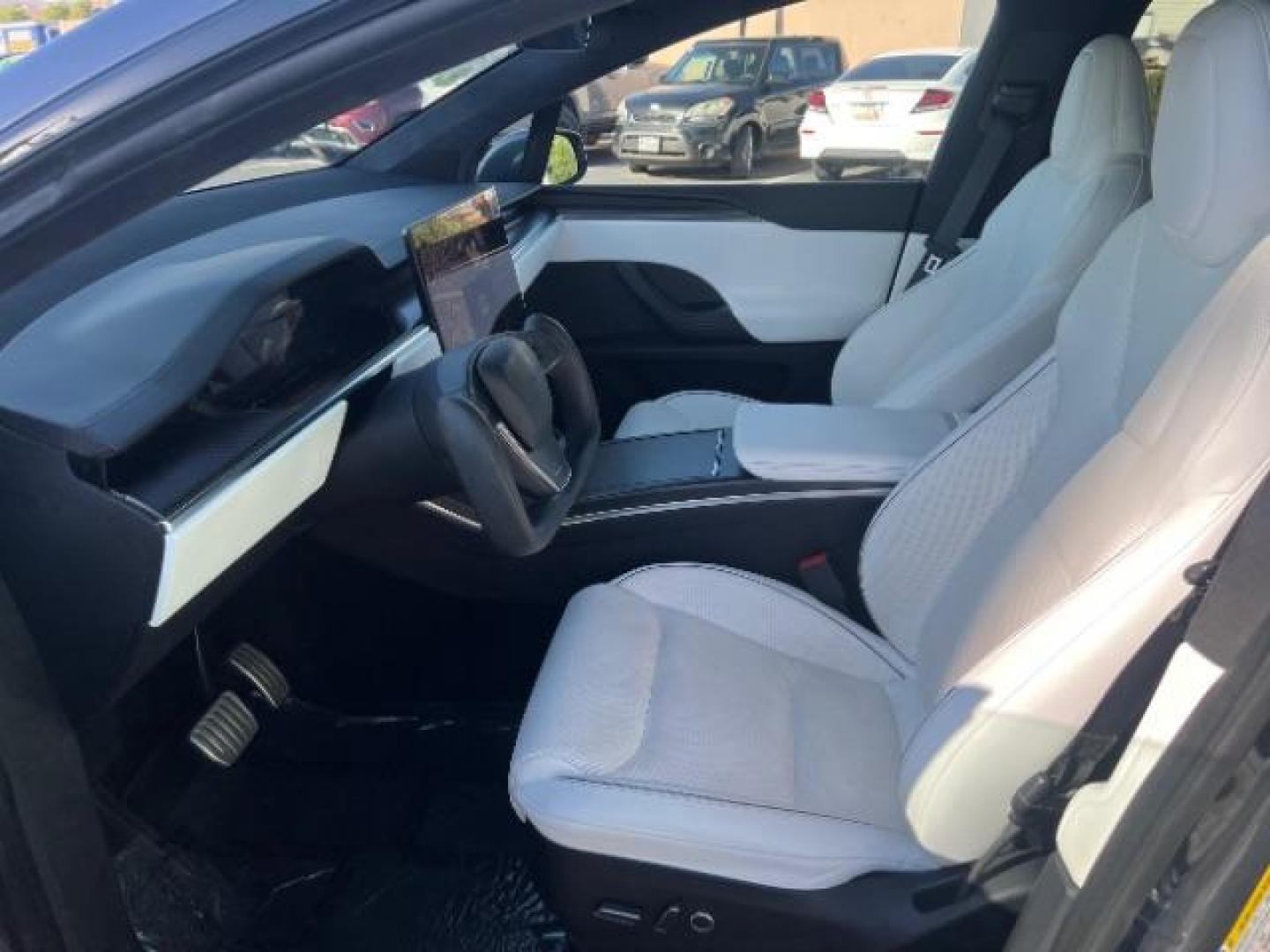 2022 Midnight Silver Metallic /White/Black Tesla Model X Plaid Tri Motor All-Wheel Drive (7SAXCBE65NF) with an ELECTRIC engine, Continuously Variable Transmission transmission, located at 1865 East Red Hills Pkwy, St. George, 84770, (435) 628-0023, 37.120850, -113.543640 - Beautiful Tesla Model X PLAID with 6 seat white interior. Brand new tires, 22' Turbine wheels, Auto pilot, Yoke steering wheel, Tow Package, Hepa air filter Full self driving with $99 month subscription, Super clean! Gets 280 on a full charge (90%) battery health. Has full battery and motor warr - Photo#16
