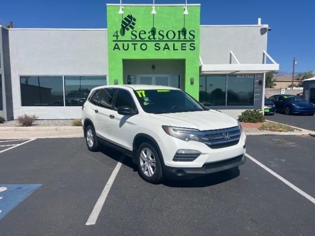 2017 White Diamond Pearl /Black Honda Pilot LX (5FNYF5H14HB) with an 3.5L V-6 gasoline direct injection engine, Automatic transmission, located at 940 North Main Street, Cedar City, UT, 84720, (435) 628-0023, 37.692936, -113.061897 - We specialize in helping ALL people get the best financing available. No matter your credit score, good, bad or none we can get you an amazing rate. Had a bankruptcy, divorce, or repossessions? We give you the green light to get your credit back on the road. Low down and affordable payments that fit - Photo#0